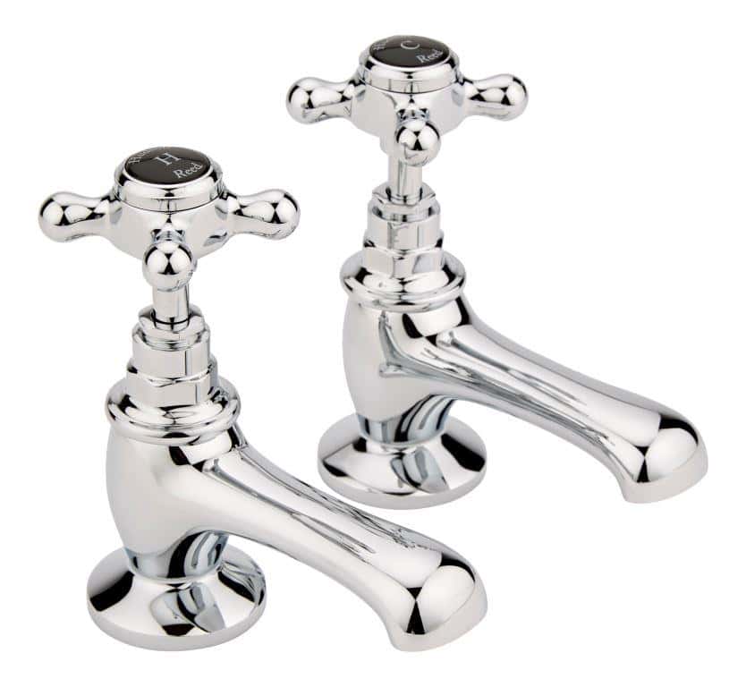 Chrome classic bathroom sink taps, vintage-style hot and cold water faucet set, suitable for traditional bathroom renovation and plumbing accessories.