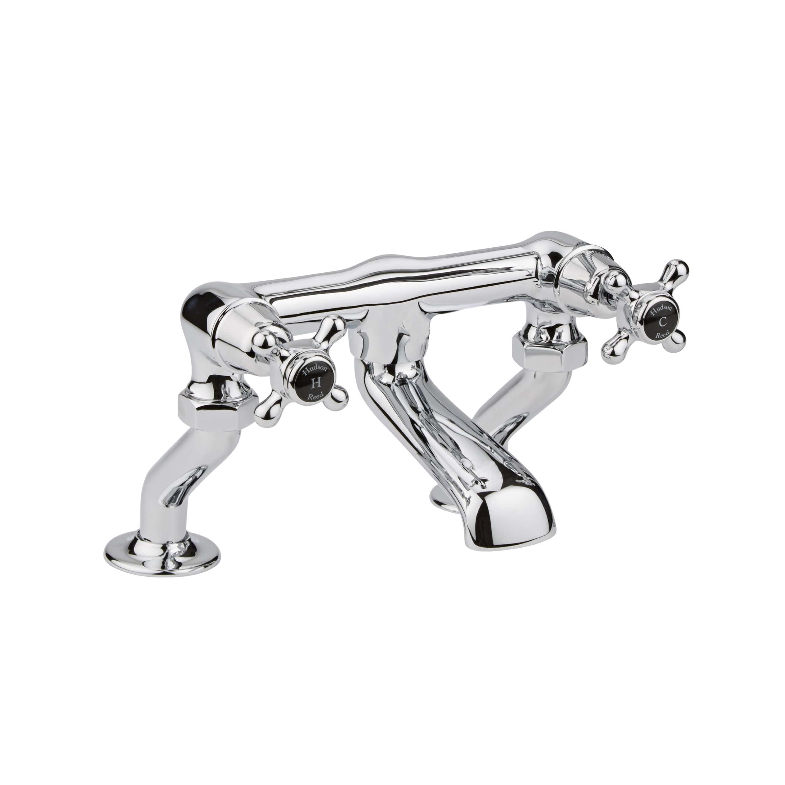 Polished chrome vintage-style bathroom basin tap with cross handles, ideal for traditional bathroom decor. Easy to operate with dual hot and cold controls, crafted for durability and elegant design.