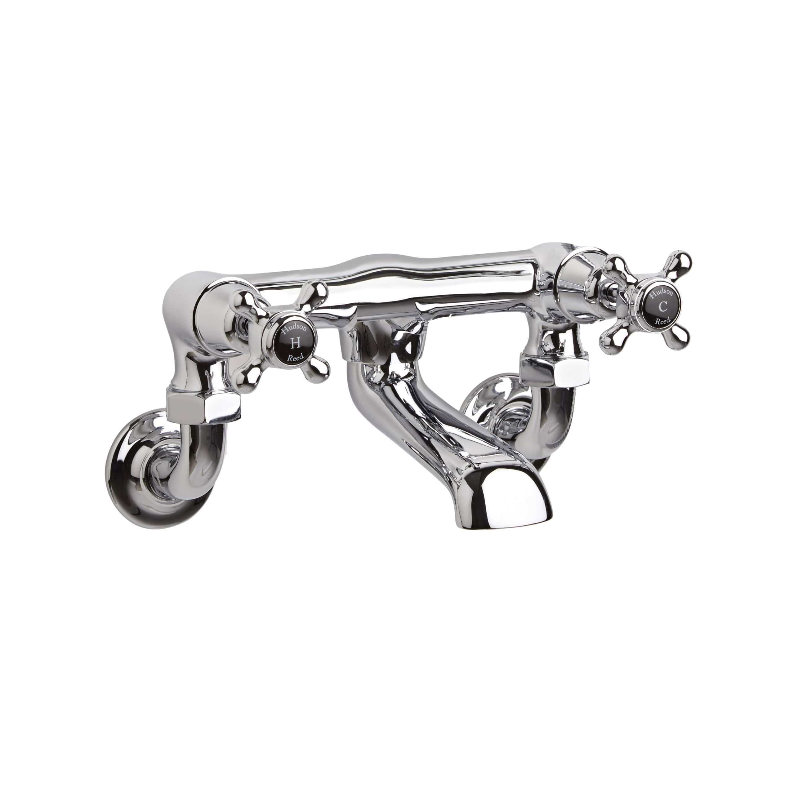 Nostalgic chrome dual handle wall-mounted bathroom tap with cross-shaped handles for traditional bathroom style. Rugged, durable design perfect for vintage or classical bathroom decor.