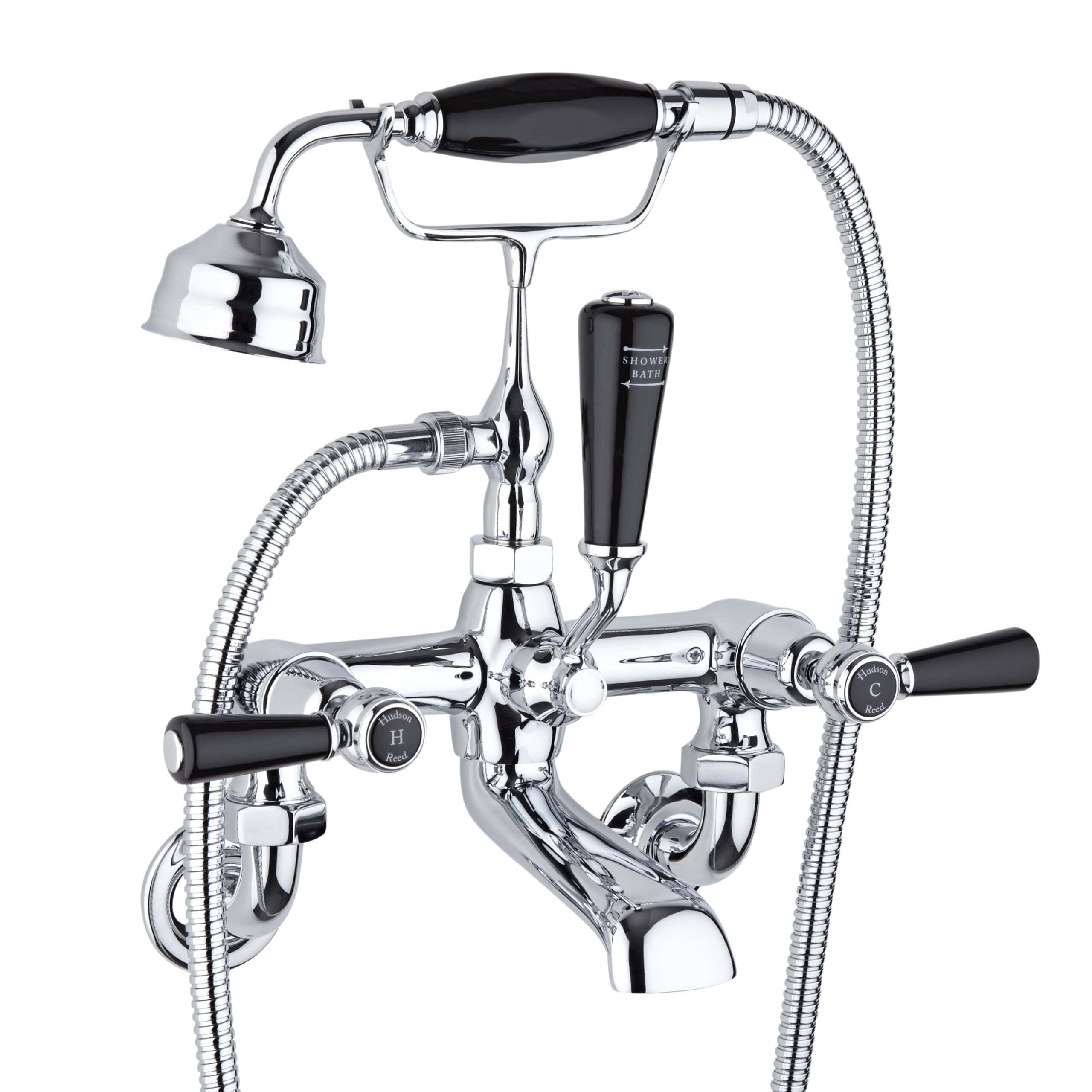Brass shower tap with handheld shower head and flexible hose, vintage style bathroom fixtures, chrome finish, ideal for modern or traditional bathrooms, showcasing quality plumbing hardware.
