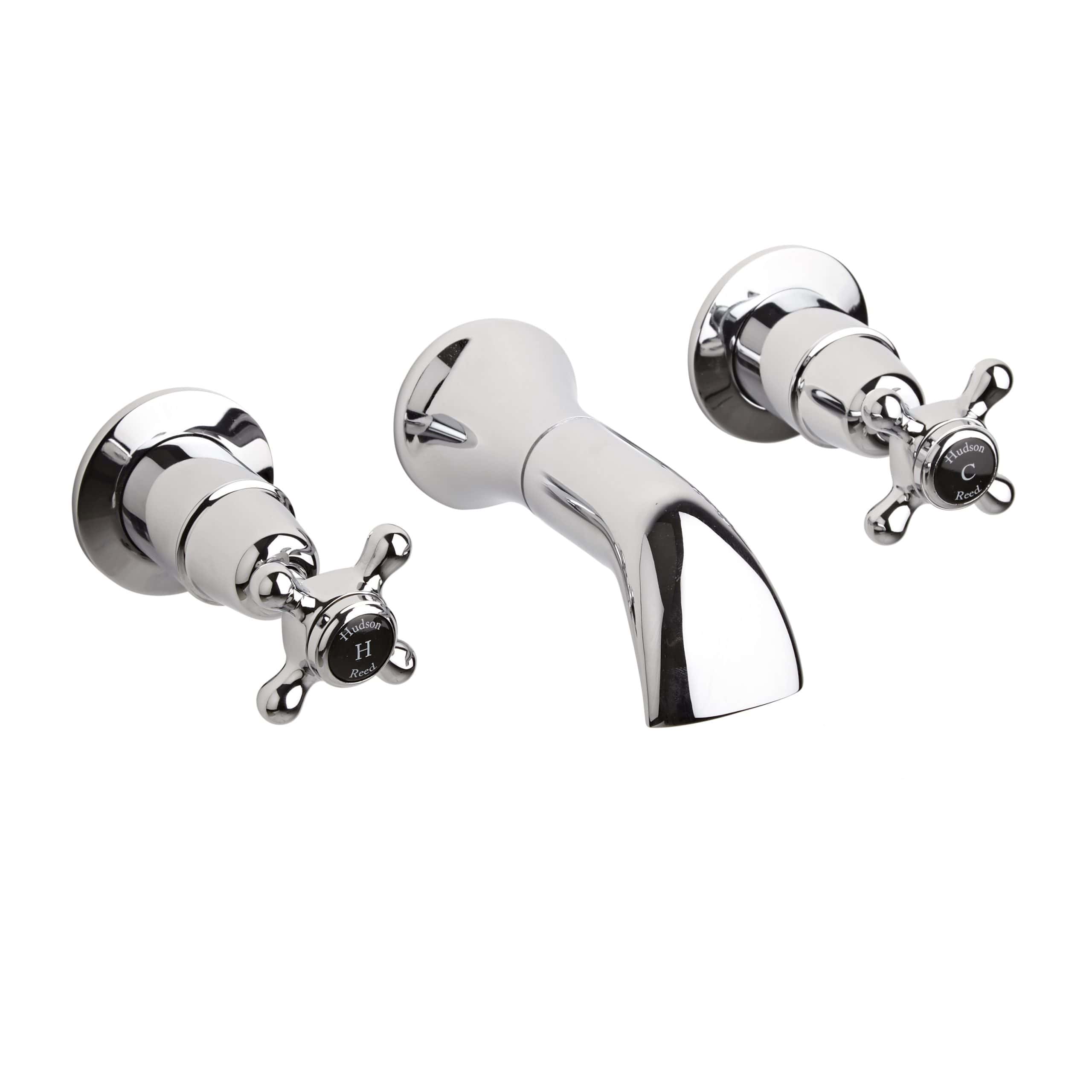 Chrome bathroom mixer tap with traditional cross-handle controls for hot and cold water, ideal for classic or vintage bathroom designs.