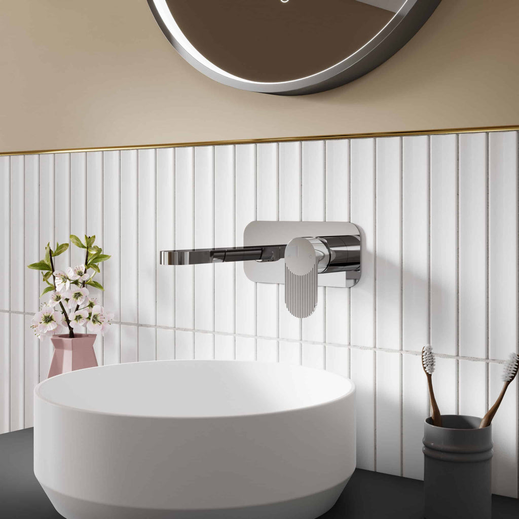Sleek modern chrome bathroom tap with adjustable temperature control, mounted on white tiled wall, ideal for contemporary bathroom design with minimalist aesthetics.