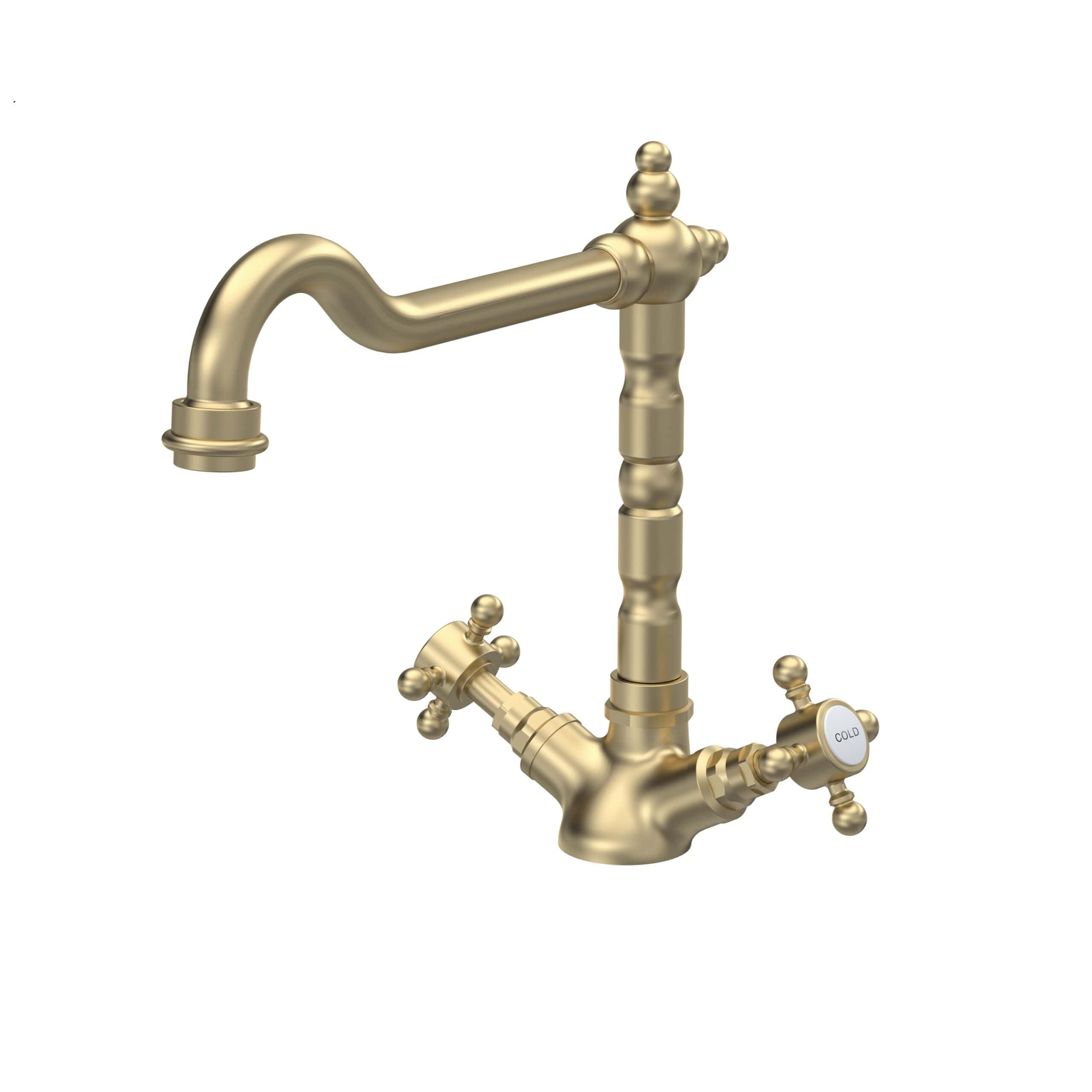 Polished gold vintage-style kitchen tap with handles for hot and cold water, featuring an elegant and classic design perfect for luxurious bathroom or kitchen renovations.