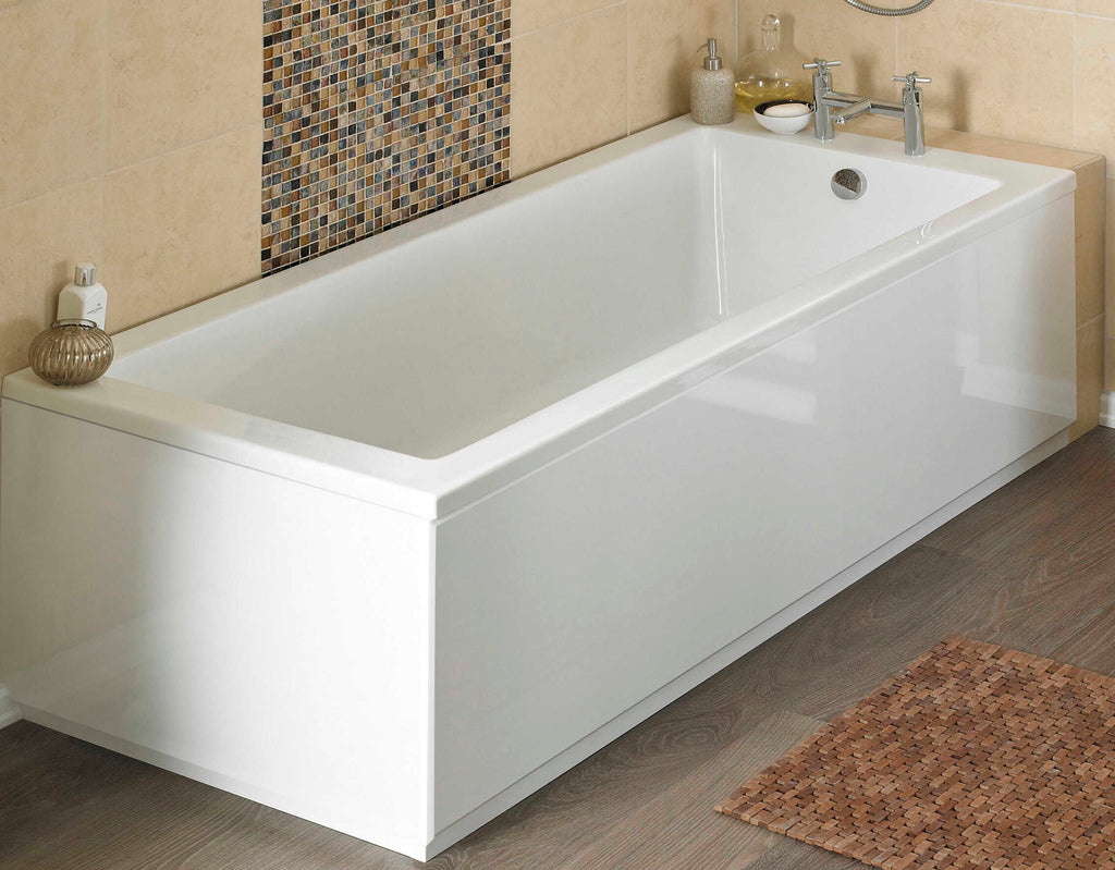 Contemporary white bathtub with sleek chrome taps and beige tiled walls, perfect for modern bathrooms and relaxation.
