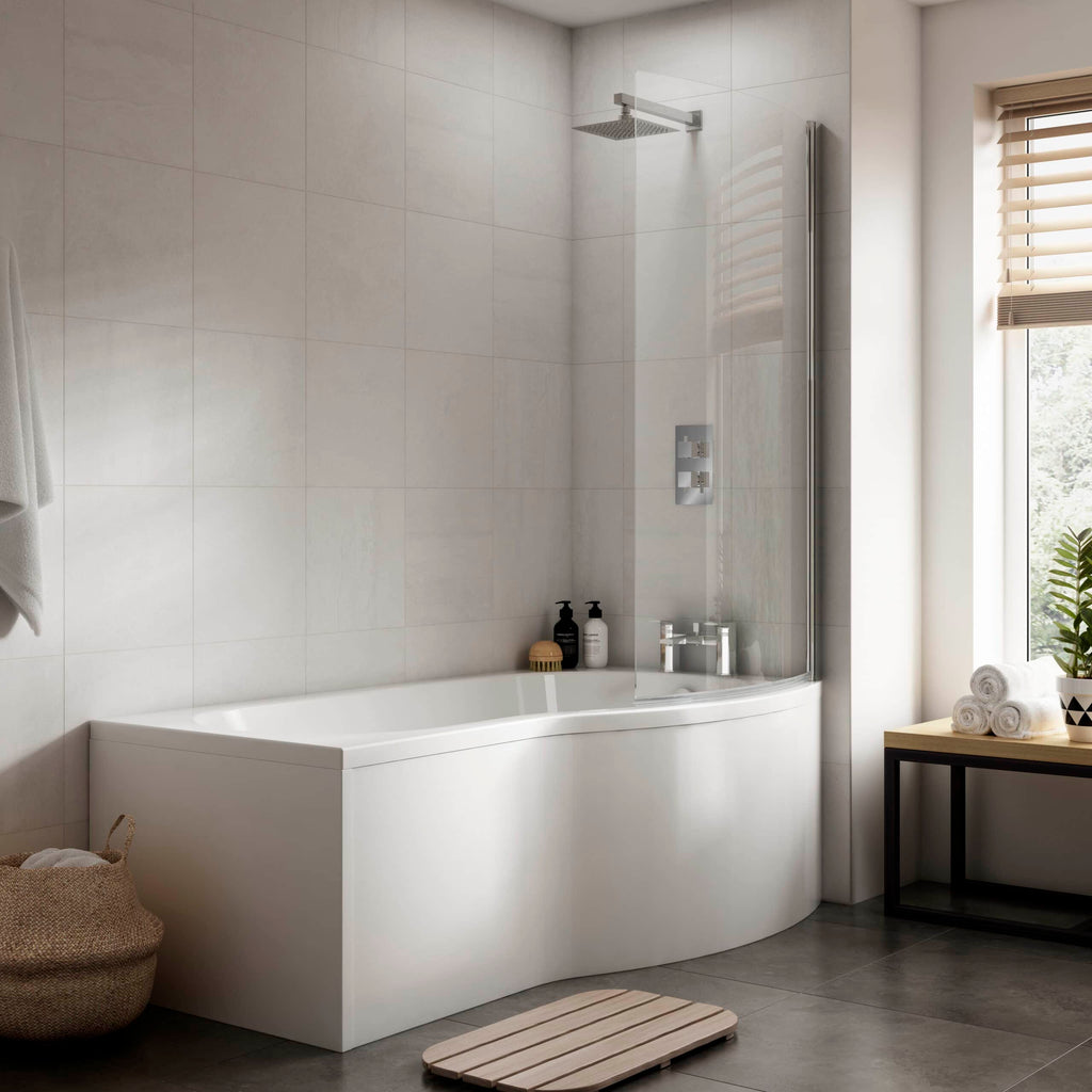 Sleek modern bathtub with glass shower screen in a minimalist bathroom with neutral tones, perfect for luxurious bathroom renovations.