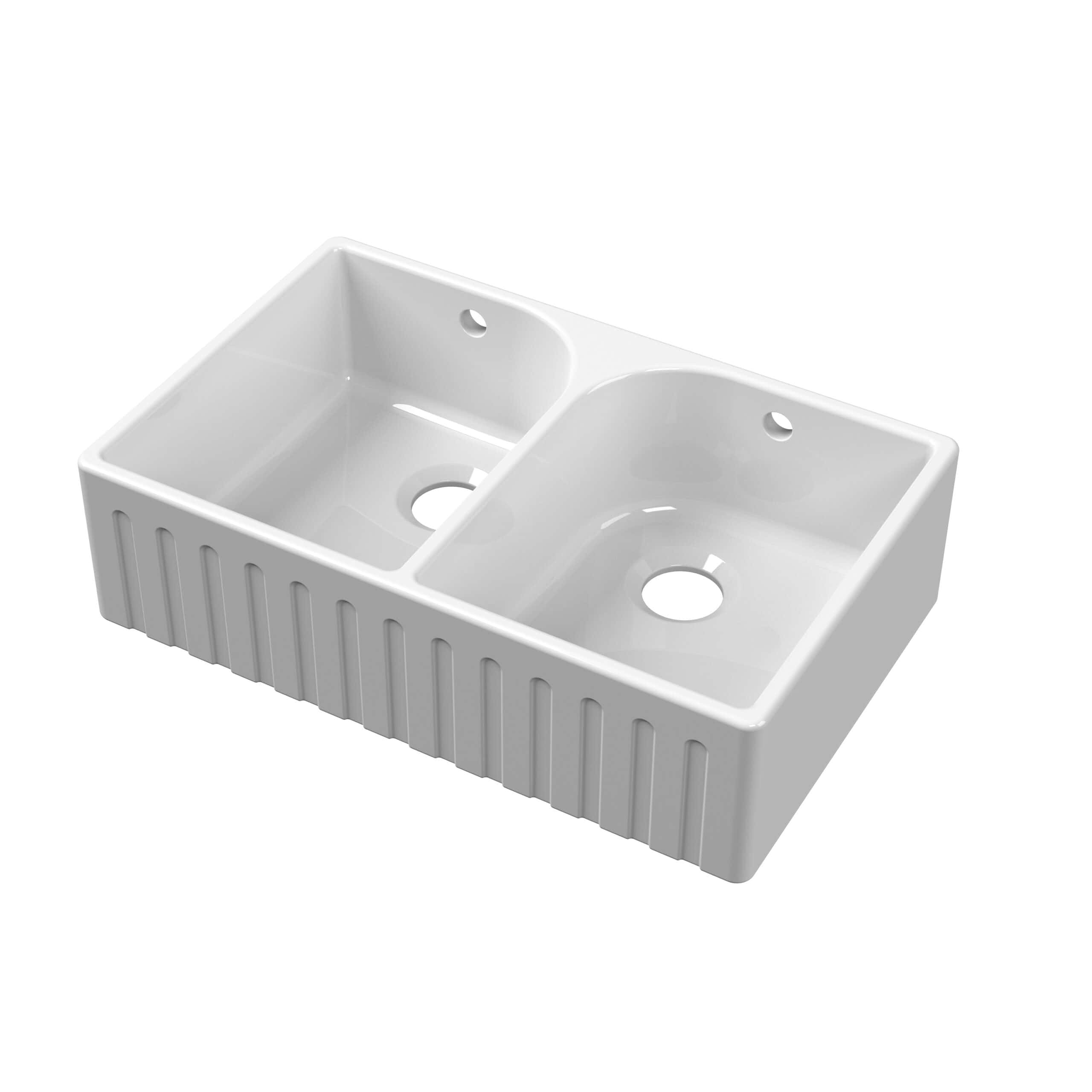 Bright white double kitchen sink by Bubly Bathrooms, featuring a durable ceramic finish and practical drainage holes. Perfect for modern kitchens and household chores.