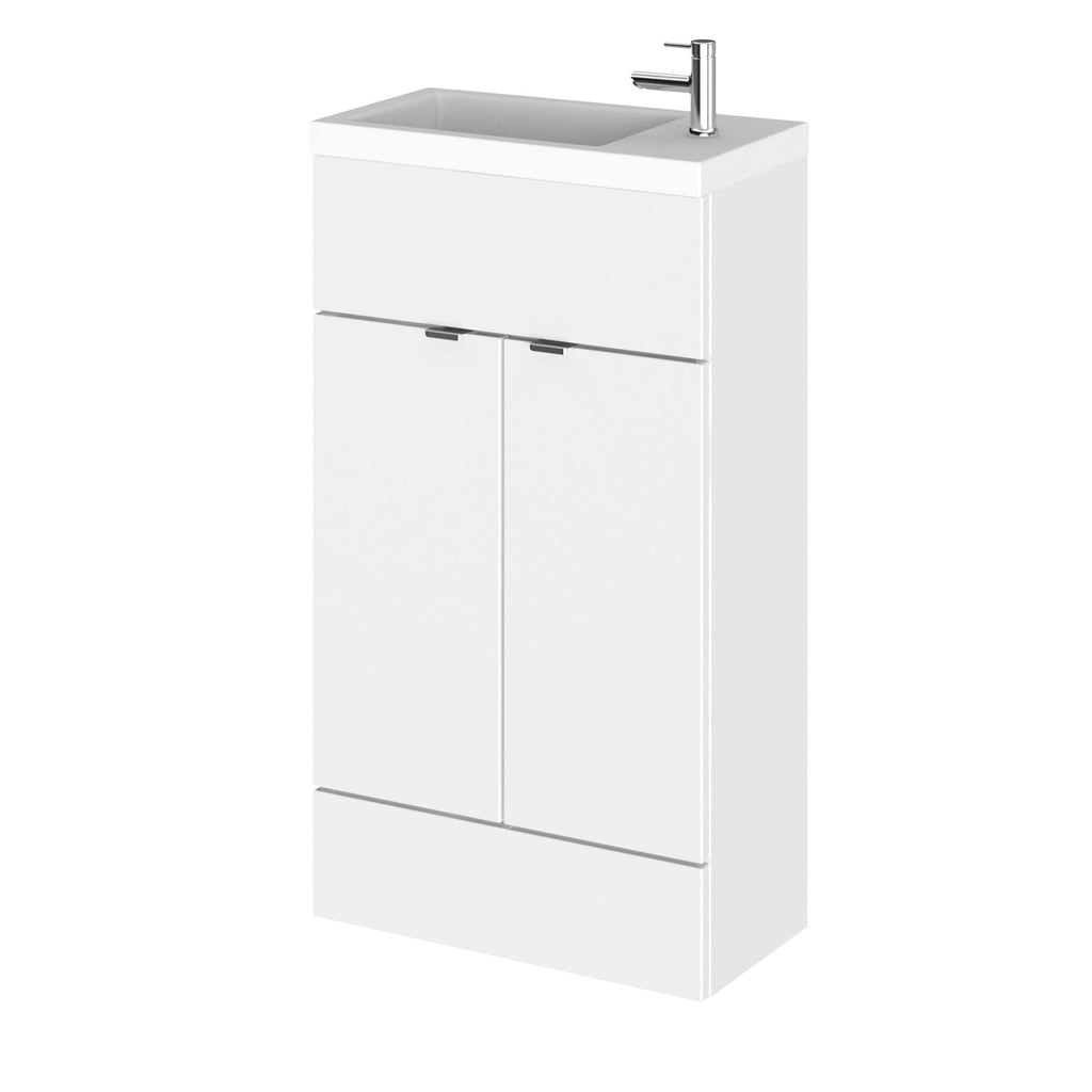 Modern white bathroom vanity with integrated sink and chrome tap for stylish bathroom upgrade.