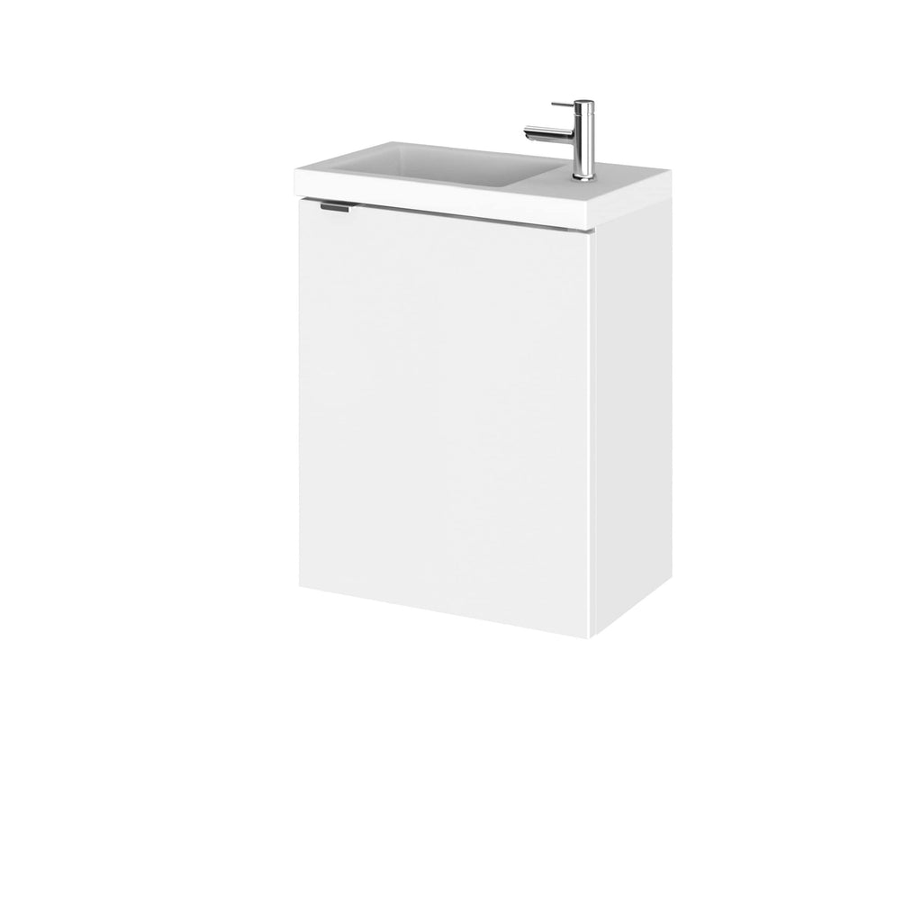Compact bathroom vanity with integrated sink and modern chrome faucet, ideal for small bathrooms and contemporary design.