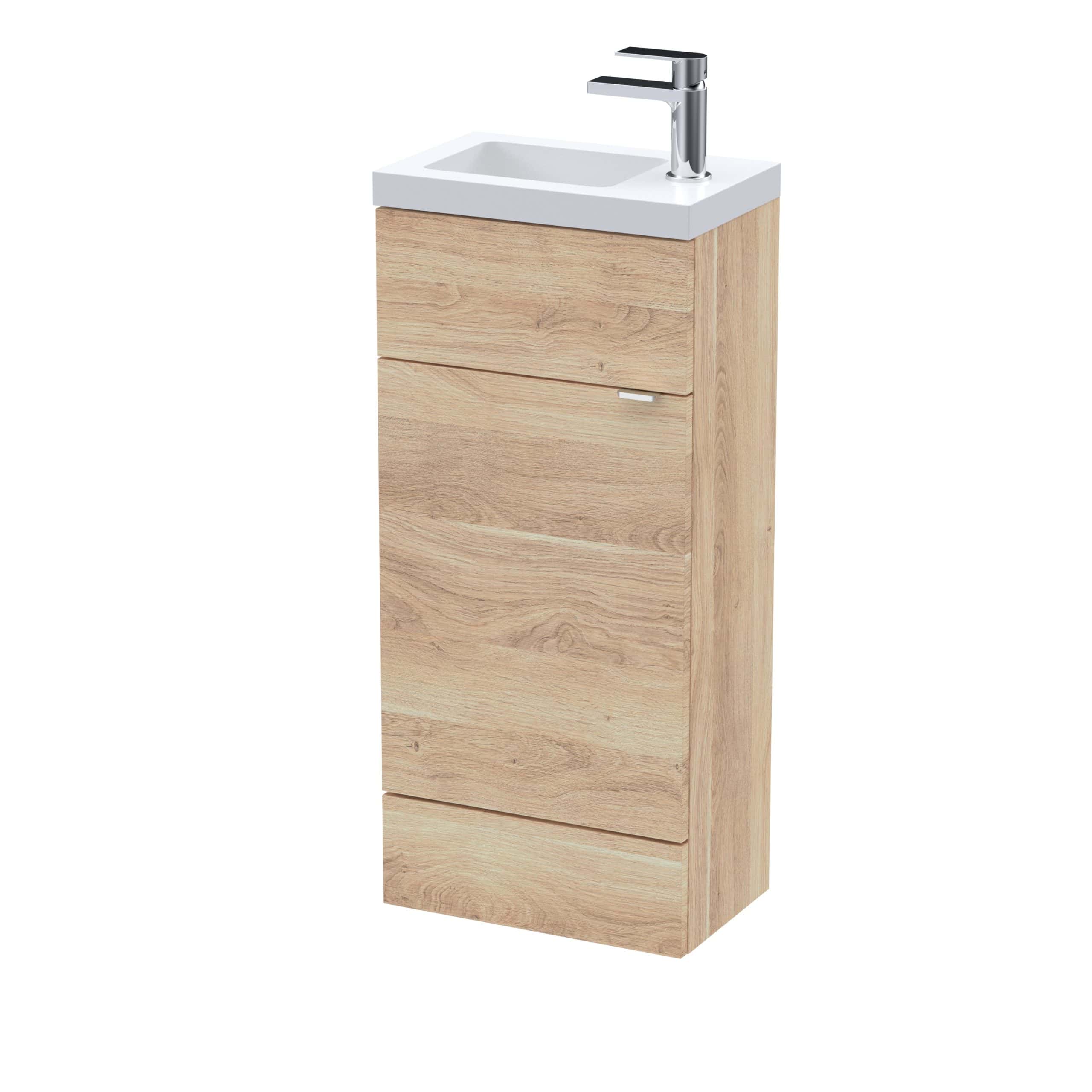 Modern wooden bathroom vanity unit with integrated ceramic sink and chrome tap, ideal for contemporary bathroom designs. Durable oak finish with storage drawers for toiletries and essentials.