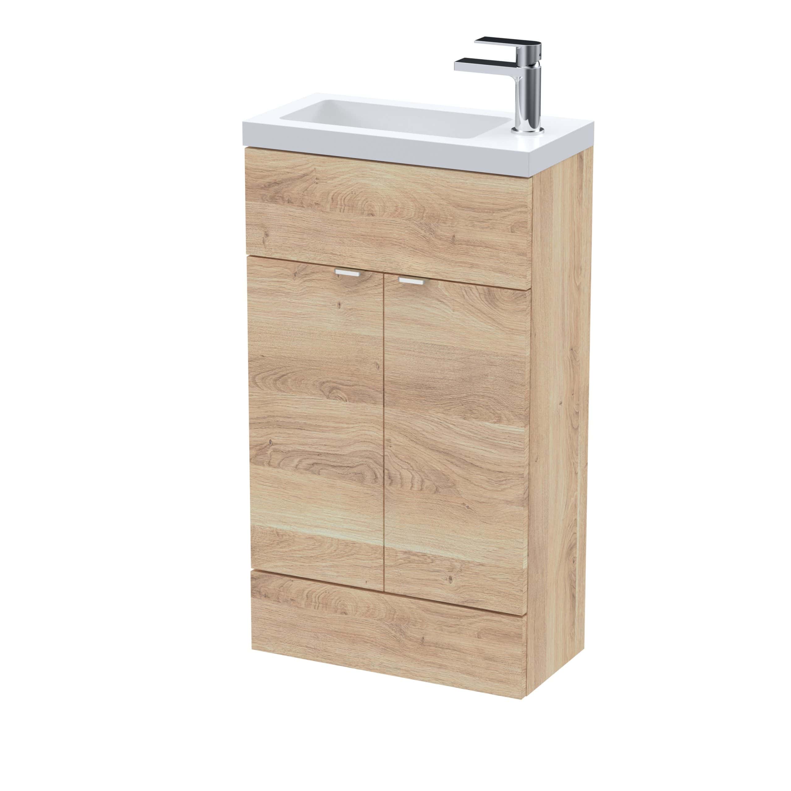 Natural wood bathroom cabinet with integrated sink and modern chrome faucet, ideal for contemporary bathroom storage solutions. Perfect for sleek, stylish, and functional bathroom decor.