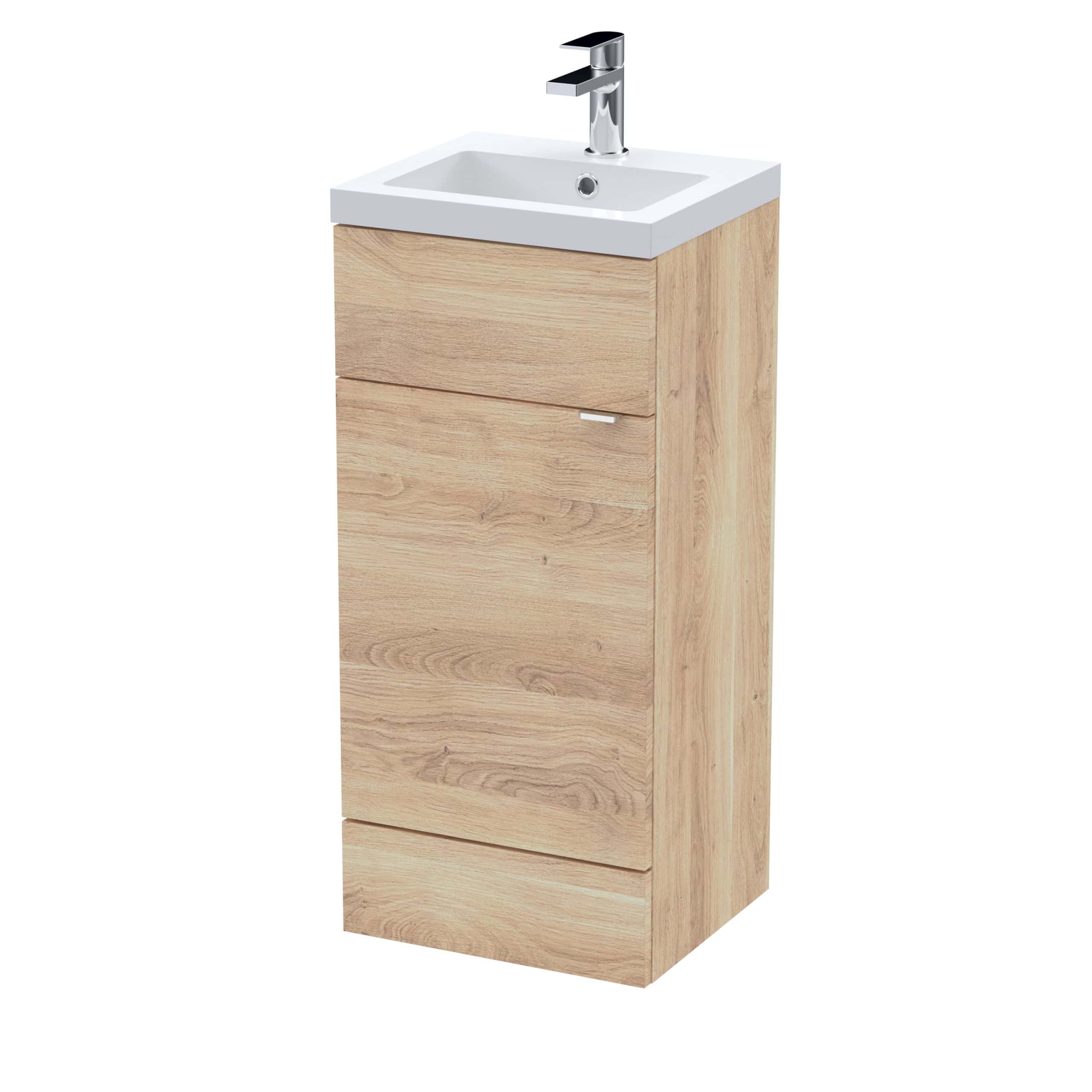 Modern bathroom sink cabinet with a white ceramic basin and chrome faucet, wooden finish, storage drawers, ideal for bathroom renovation and contemporary bathrooms.
