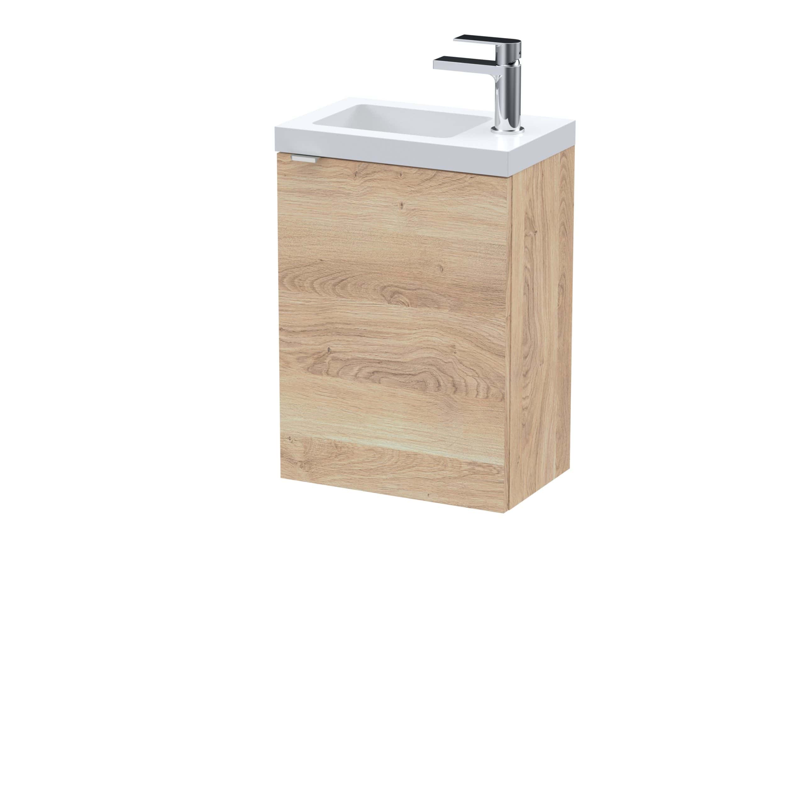 Modern bathroom vanity with a built-in sink and chrome faucet, featuring a light wood finish for contemporary bathroom decor.