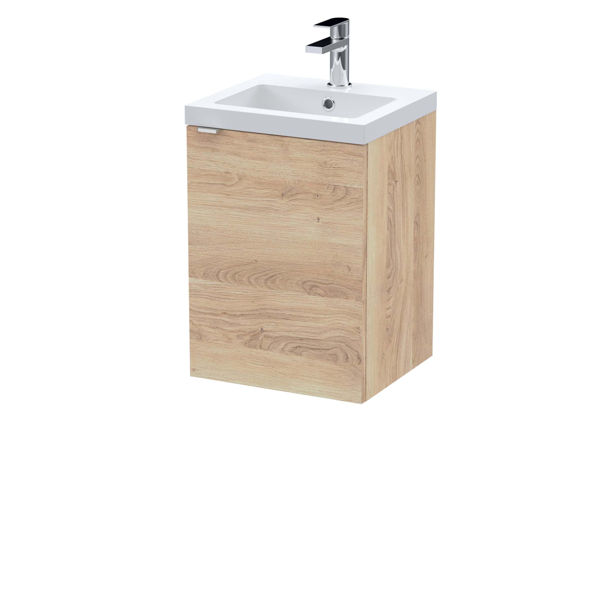 Contemporary bathroom wash basin with wooden cabinet and chrome tap, ideal for modern bathroom interiors. Perfect for stylish and functional bathroom accessories.