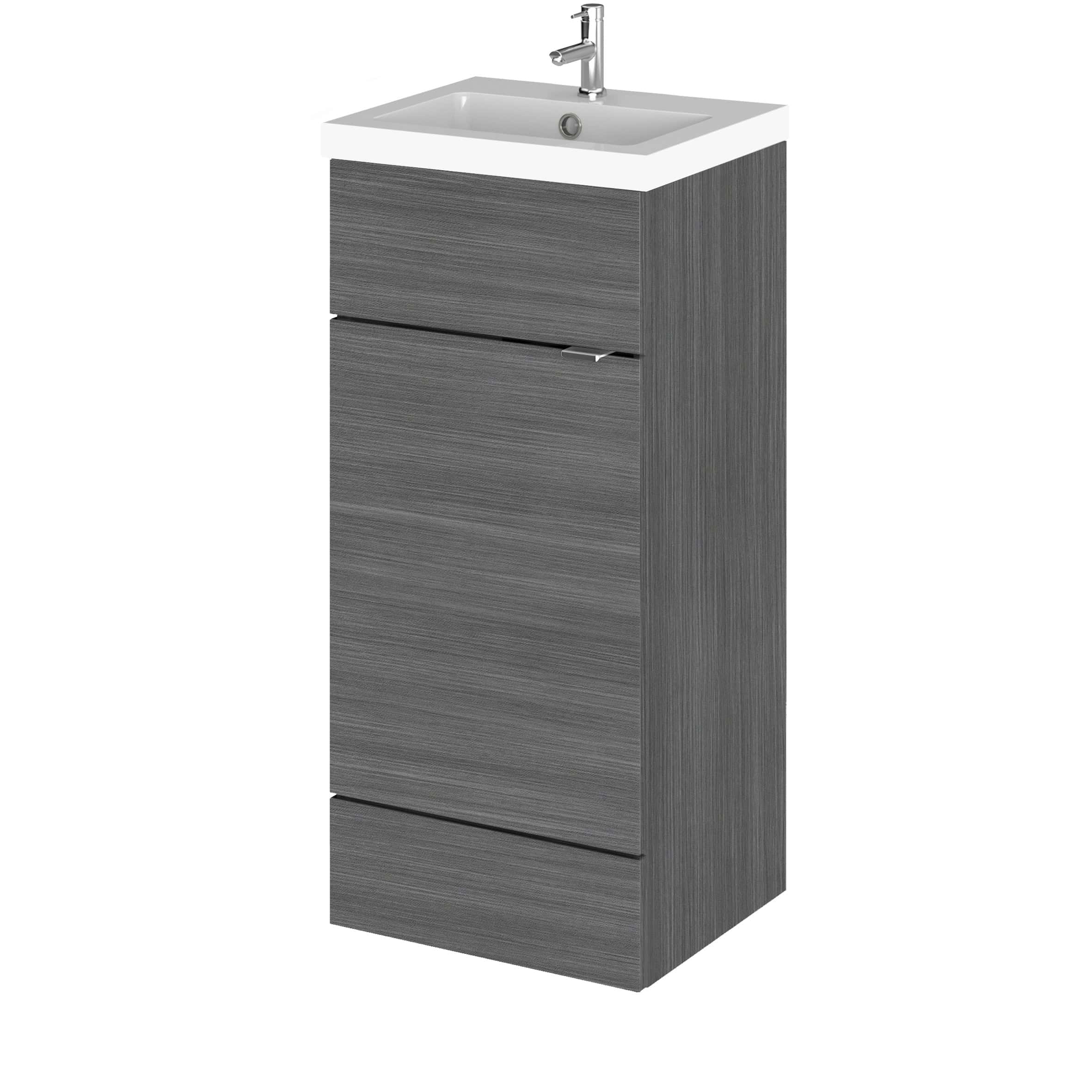 Sleek grey bathroom vanity unit with integrated sink and modern chrome tap, ideal for contemporary bathroom decor and space-saving storage solutions.