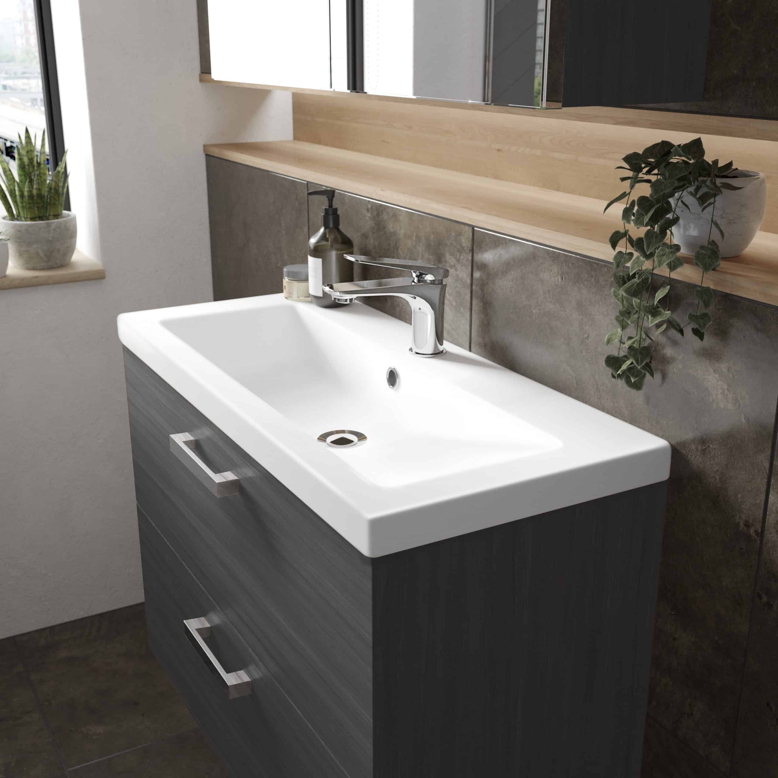 Contemporary bathroom vanity with integrated sink, dark wood finish, and modern chrome faucet. Minimalist design, ideal for stylish and functional bathroom upgrades.