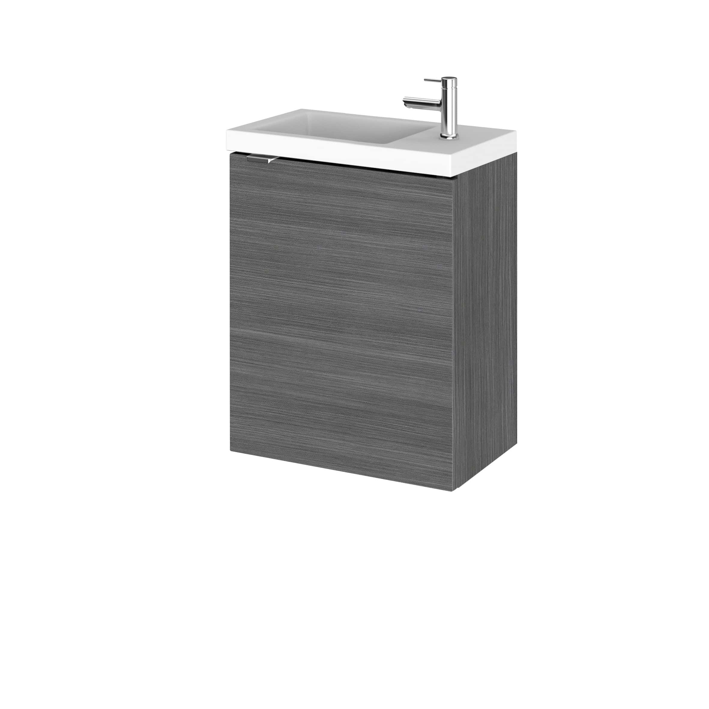 Modern bathroom vanity unit with integrated sink and chrome tap, featuring sleek grey wood finish, ideal for contemporary bathroom designs.