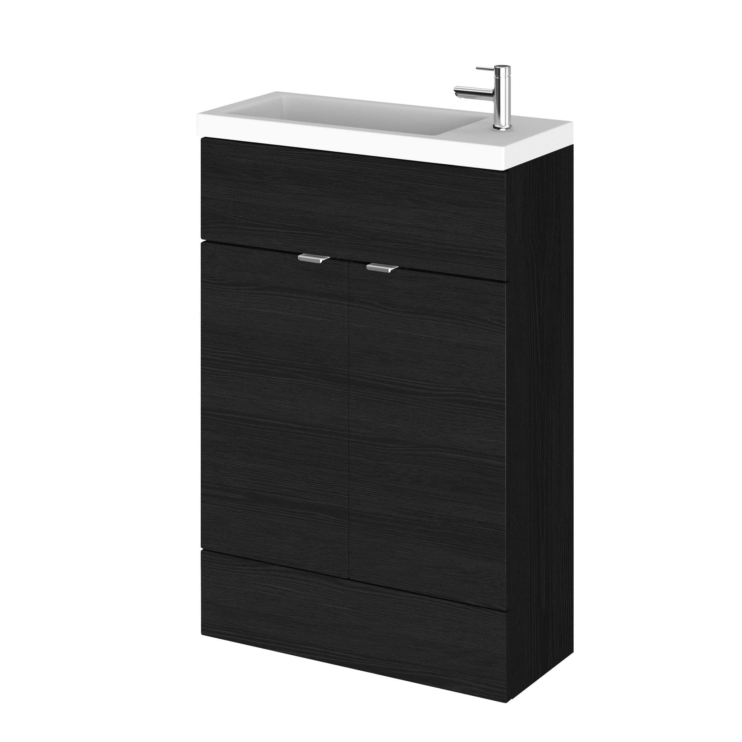 Modern black bathroom vanity with integrated sink and chrome faucet for contemporary bathroom renovation.