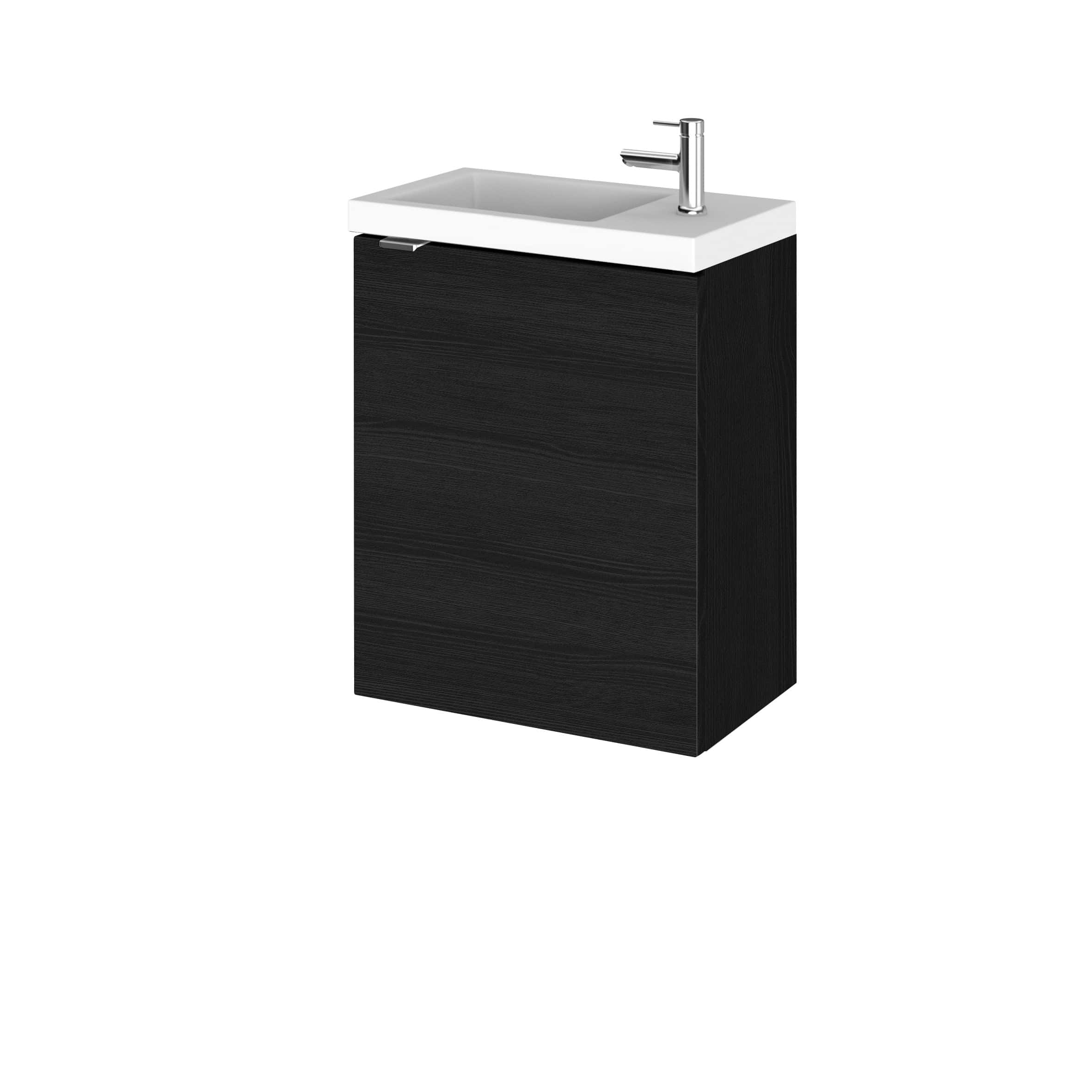 Sleek bathroom vanity unit with integrated sink and modern chrome tap, perfect for contemporary bathroom decor and space-saving storage solutions.