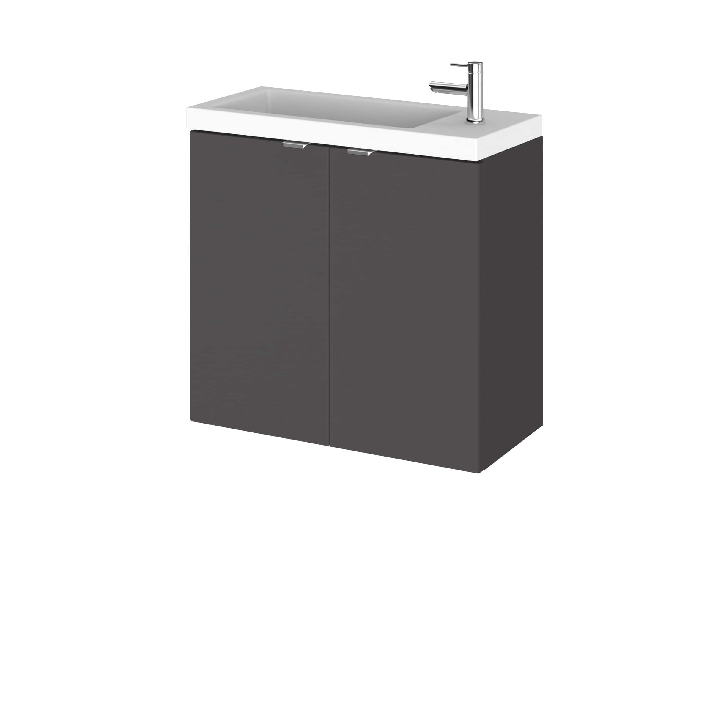 Modern bathroom vanity with integrated sink and sleek black cabinetry for contemporary bathroom designs.