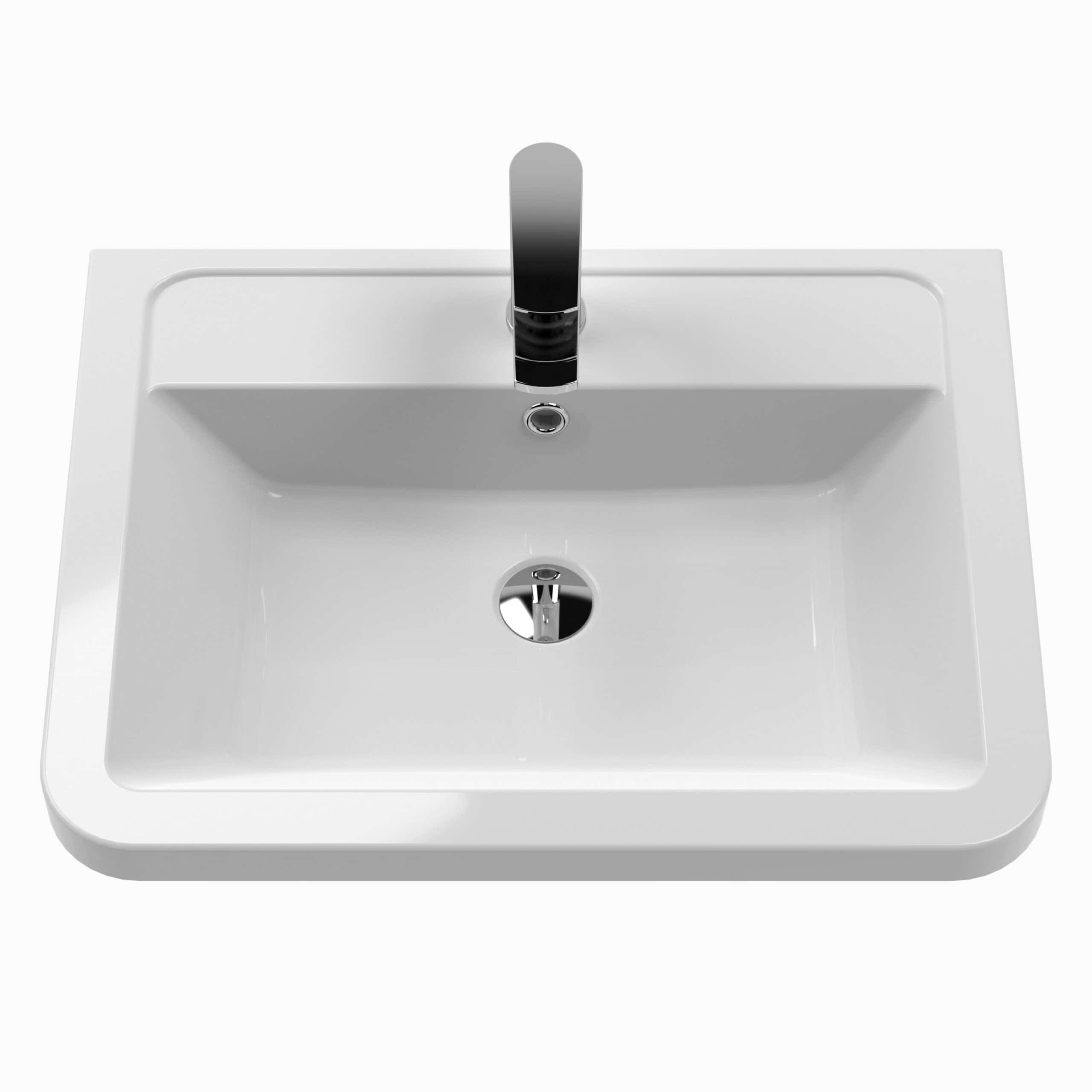 Modern white bathroom sink with a sleek chrome faucet, ideal for contemporary bathrooms and vanity units, showcasing stylish and functional bathroom fixtures.