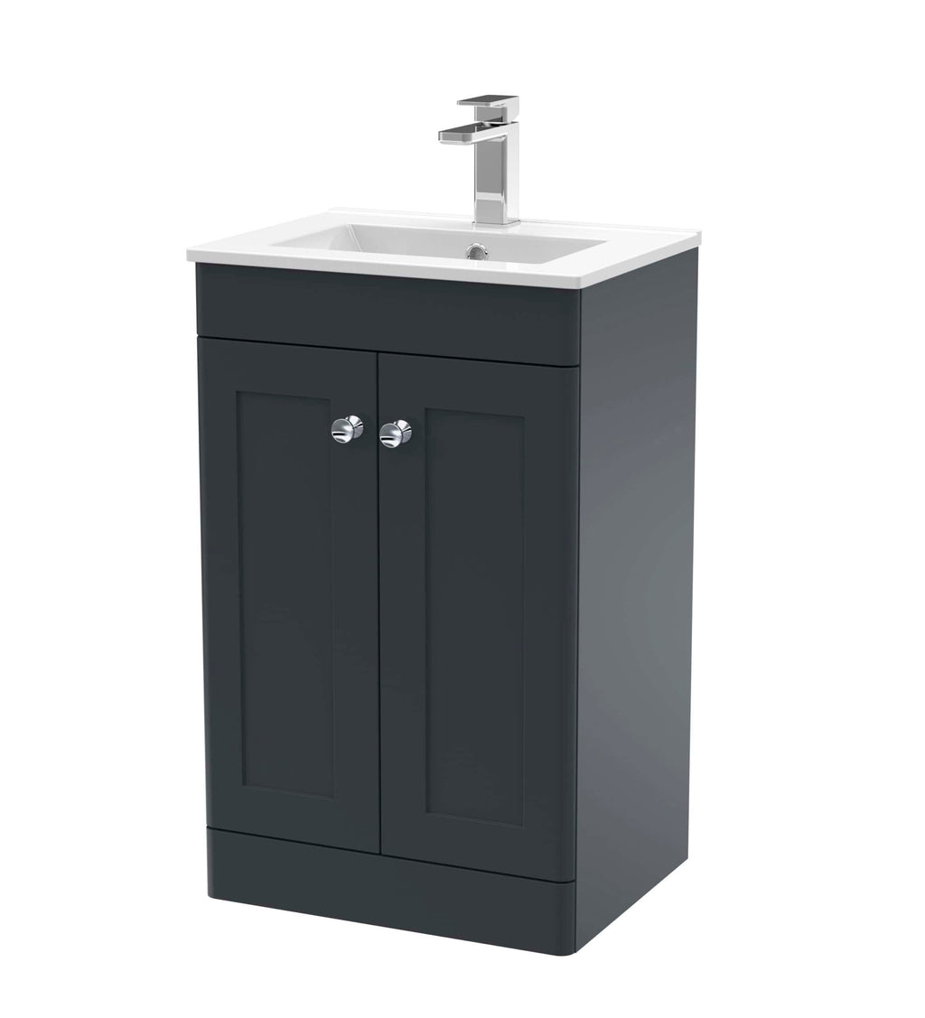 Sleek grey bathroom vanity unit with integrated sink, modern chrome handles, ideal for contemporary bathroom design and storage solutions.