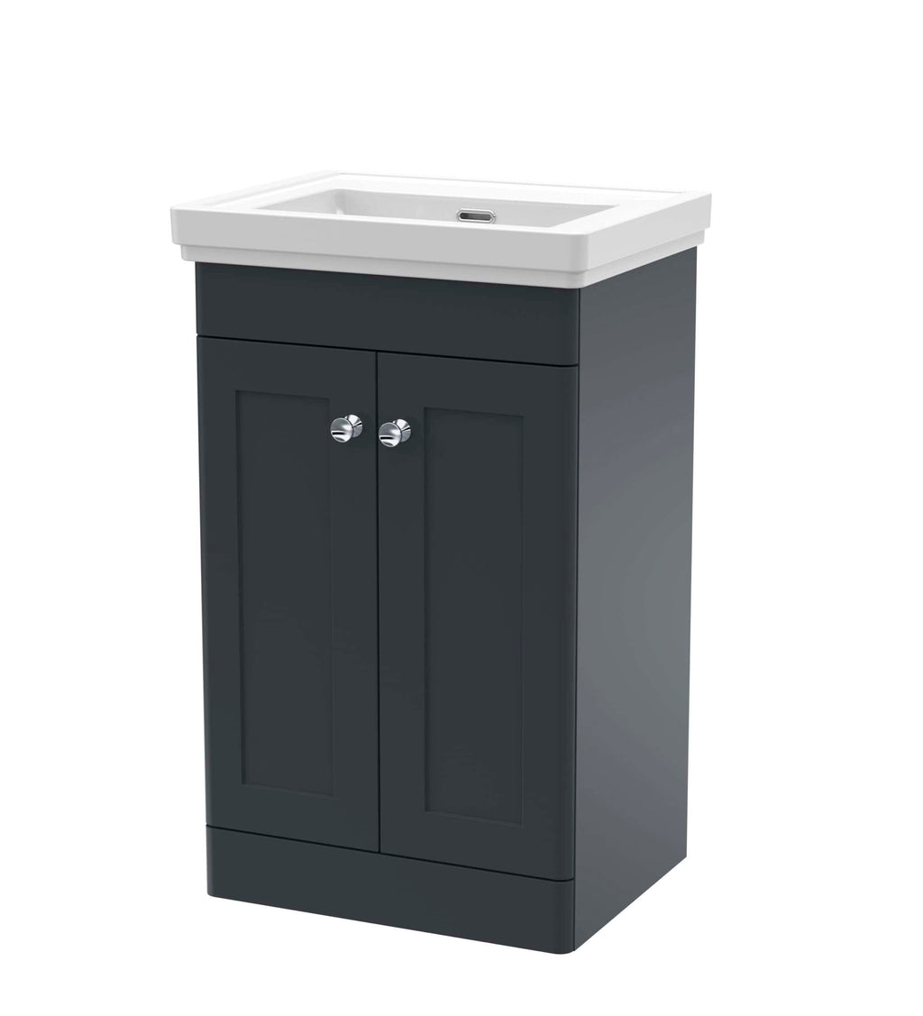 Stylish bathroom vanity unit with a white inset sink, dark grey cabinet, and chrome handles, perfect for modern bathroom furniture and fixtures.