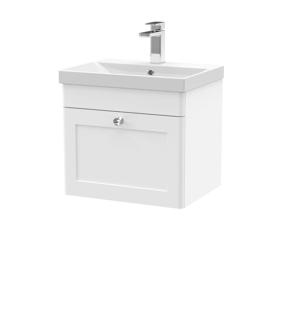White bathroom vanity with integrated sink and chrome faucet - perfect for modern bathrooms.