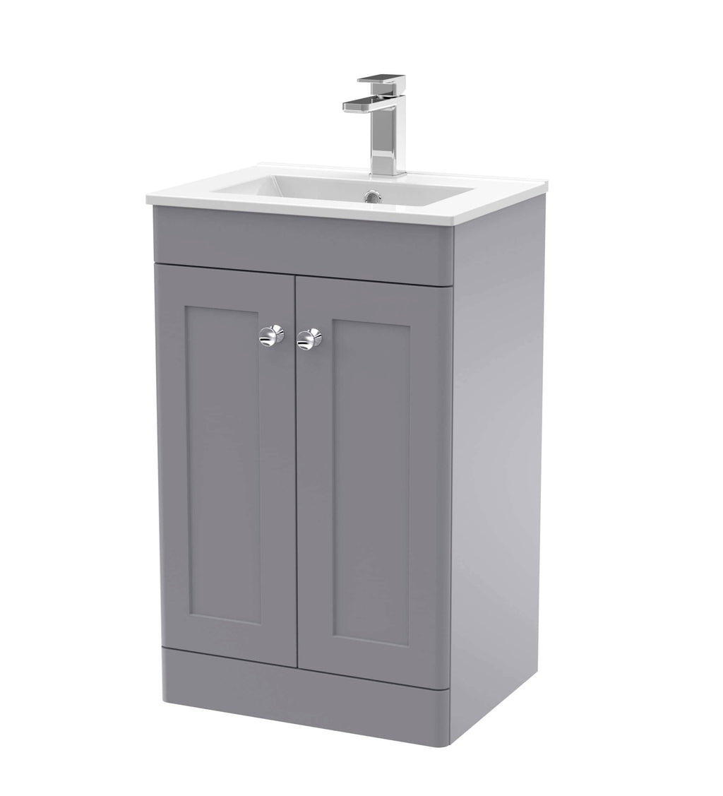 Modern grey bathroom vanity with integrated sink and chrome faucet, ideal for contemporary bathroom designs, offering stylish storage solutions and a sleek aesthetic.