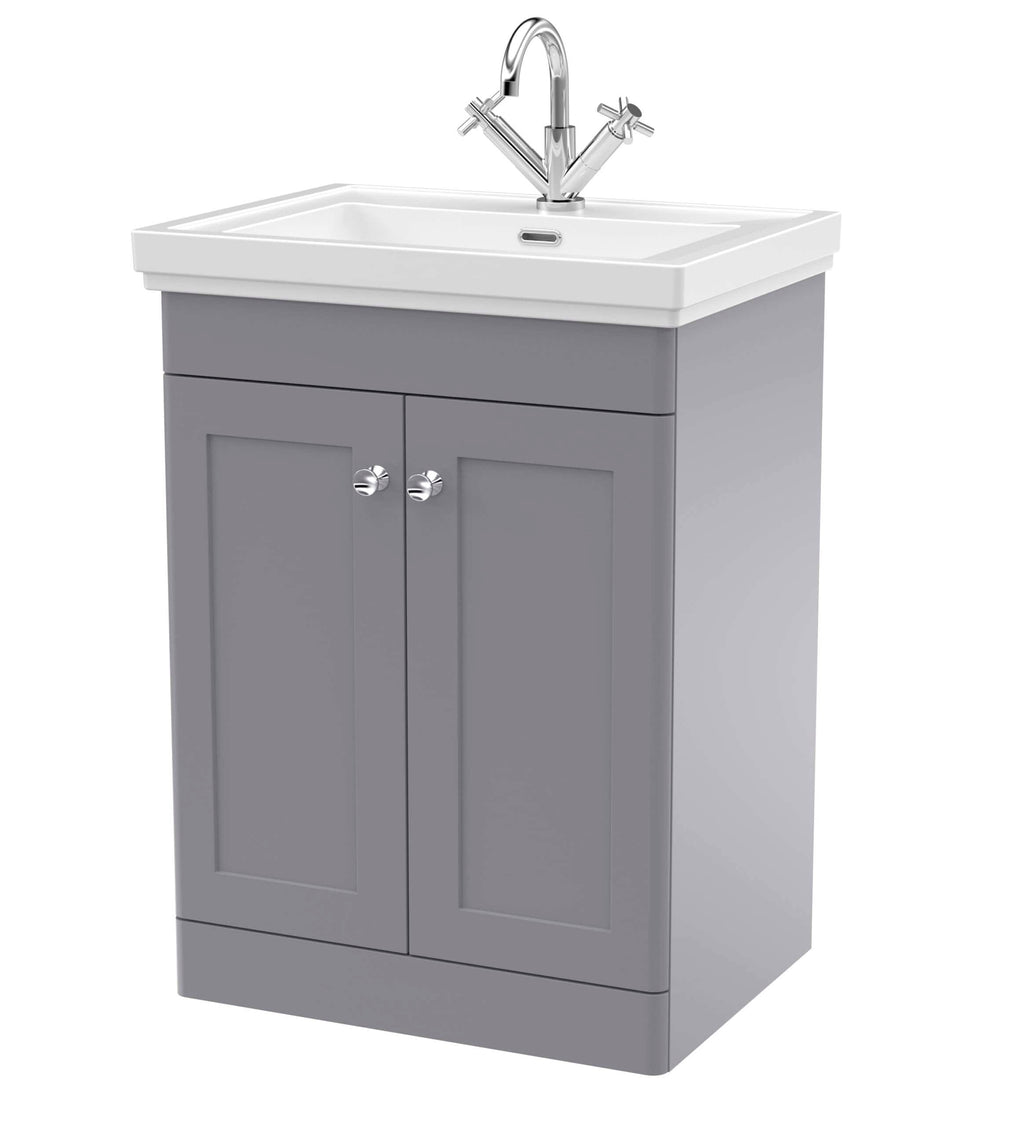 Modern grey bathroom vanity with ceramic sink and chrome taps, ideal for contemporary bathroom designs and renovation projects. Perfect for storage and stylish bathroom upgrades.