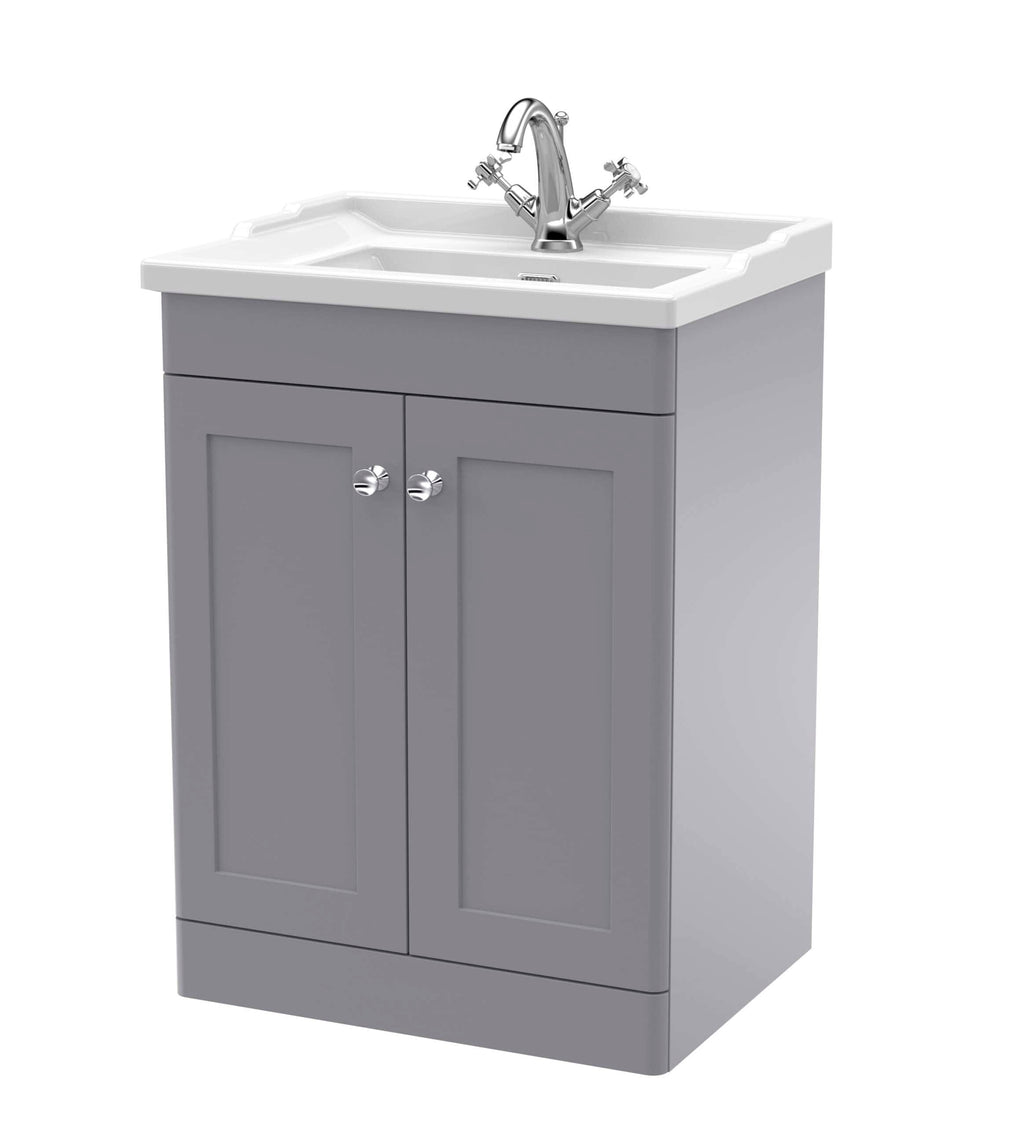 Shower sink cabinet with grey base and white ceramic top, featuring chrome taps, ideal for modern bathroom interiors.