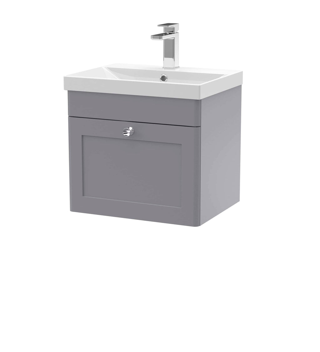 Modern grey bathroom vanity unit with integrated sink and chrome tap, ideal for contemporary bathroom design.