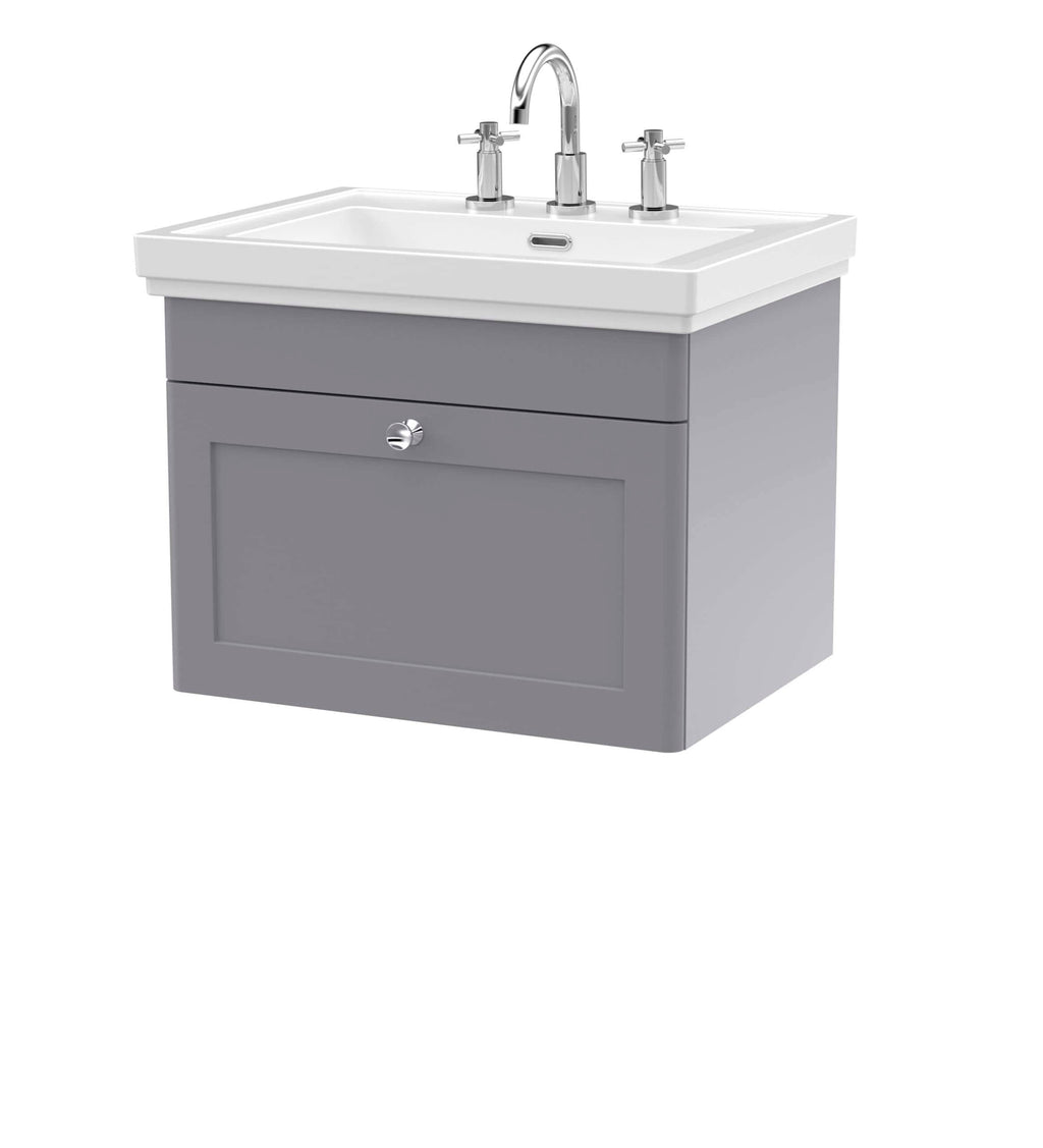 Polished bathroom vanity unit with ceramic sink and chrome taps for contemporary bathroom design.