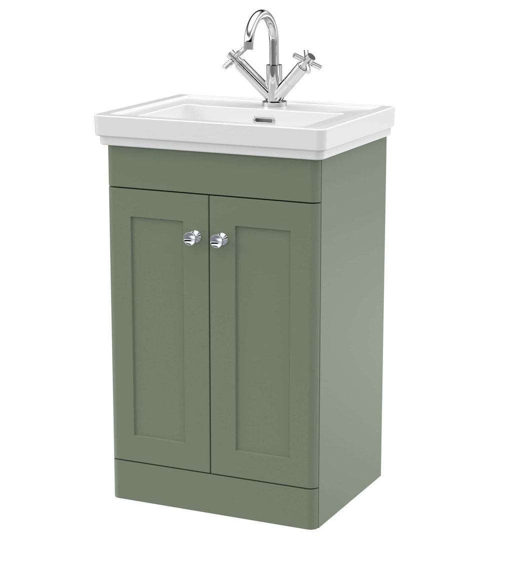 Modern green bathroom vanity with white ceramic sink and chrome tap, ideal for stylish bathroom storage and fixtures.