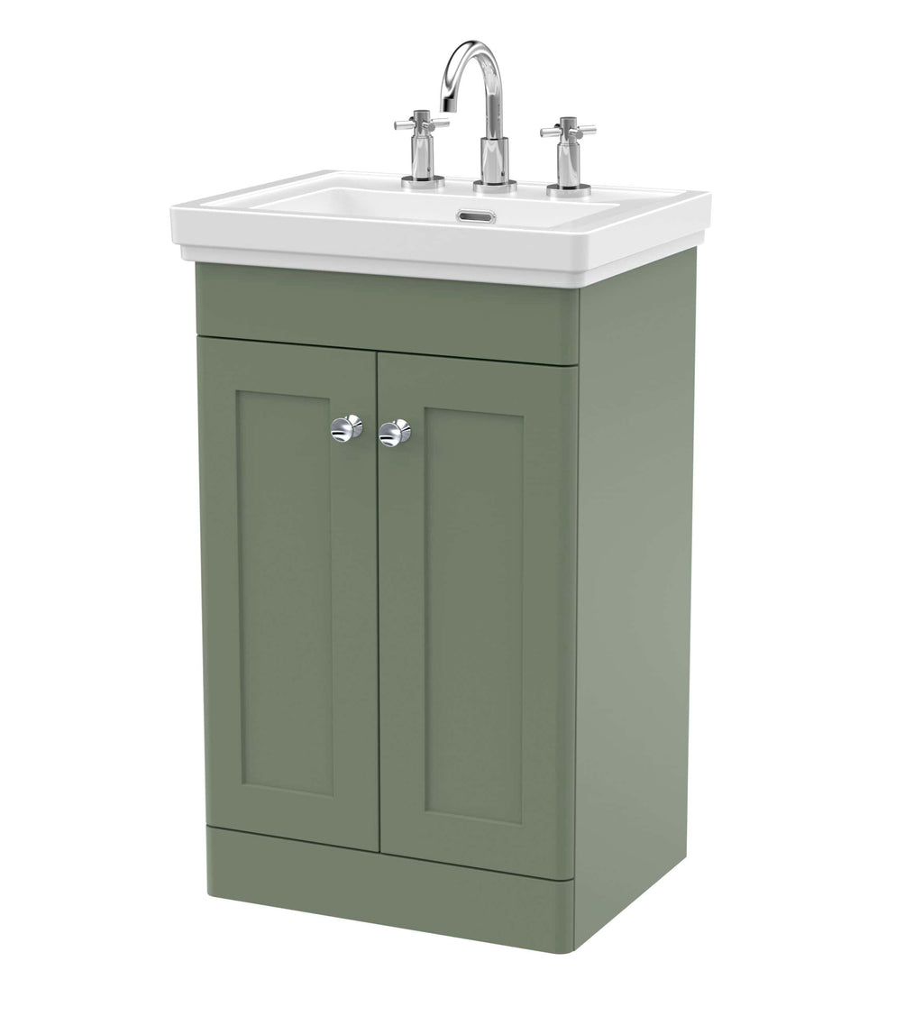 Sustainable green bathroom vanity with a white ceramic sink and chrome faucets. Perfect for modern bathrooms, combining functionality with stylish design.