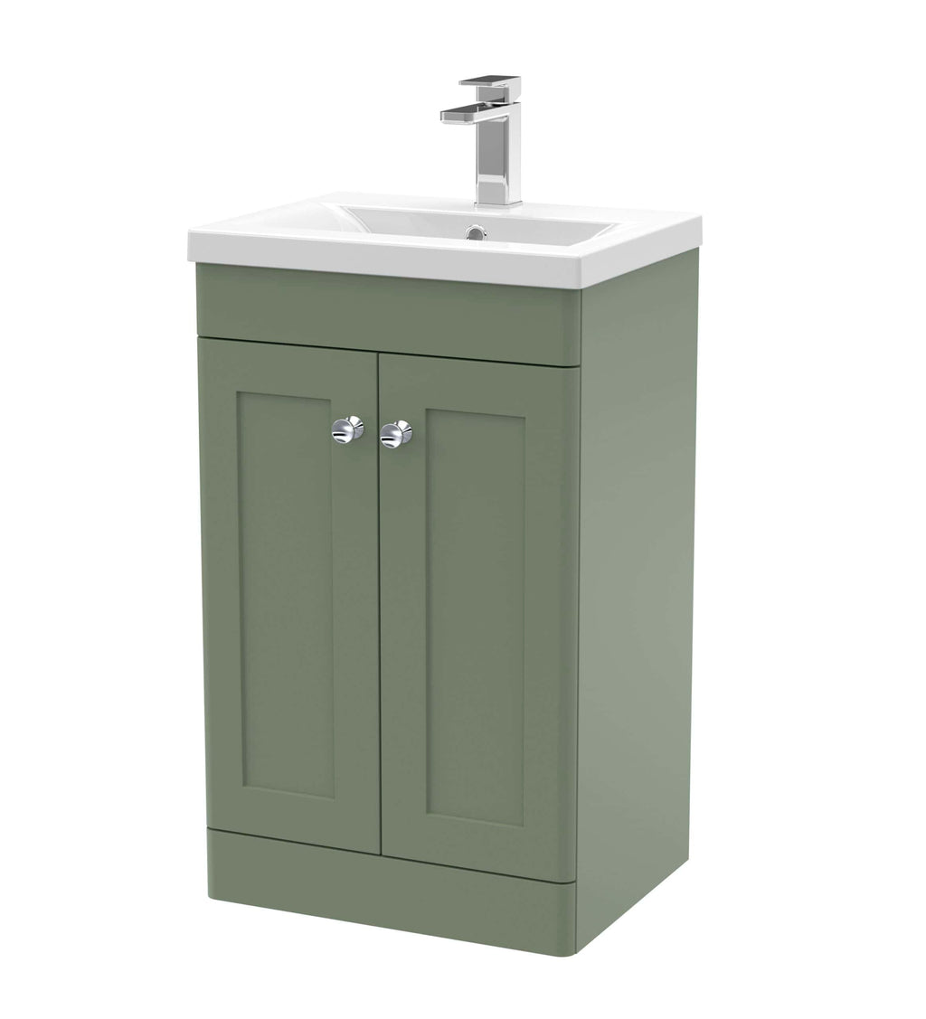 Modern bathroom vanity with fitted sink and stylish cabinetry in sage green, perfect for contemporary bathroom designs and functional storage solutions.