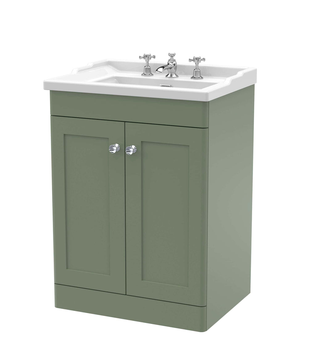 Modern bathroom vanity with green cabinet and white ceramic sink, featuring chrome taps and storage space, perfect for stylish bathroom design.