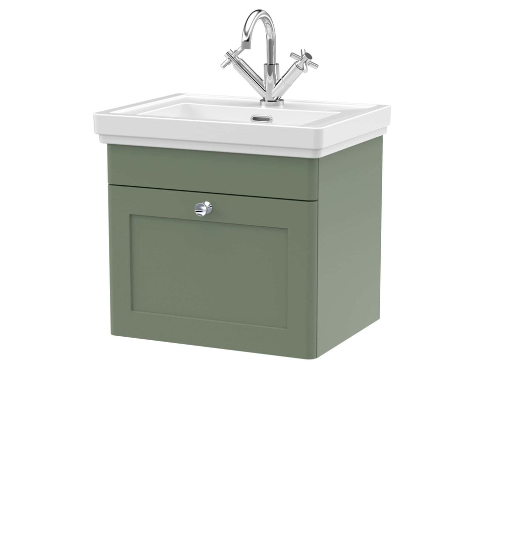 Modern bathroom vanity with a white ceramic sink and chrome tap, featuring a sage green cabinet for bathroom storage, ideal for contemporary bathroom designs.