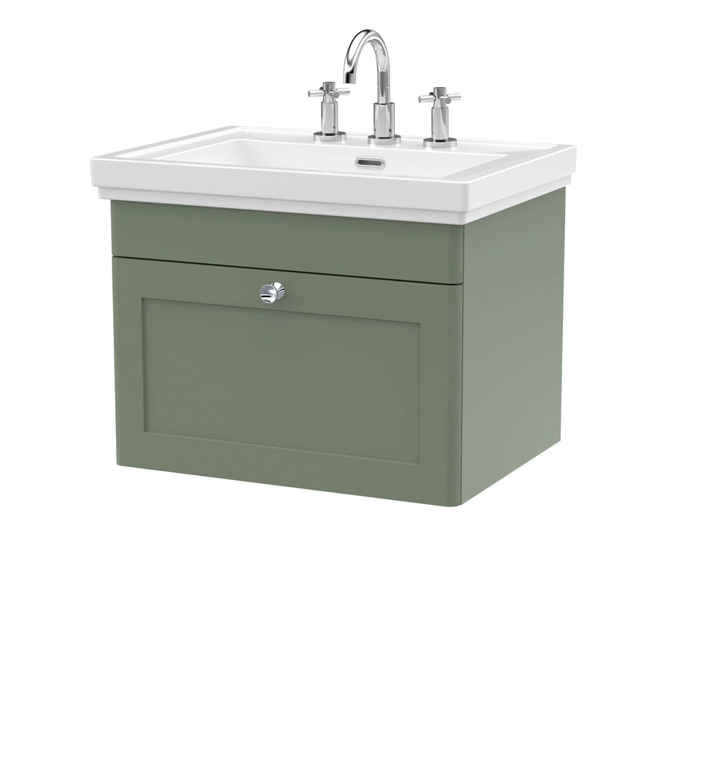 Modern bathroom sink with green vanity and chrome taps for stylish bathroom renovations.