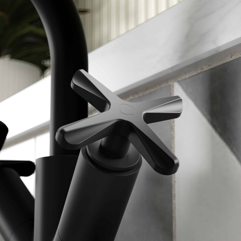 Sleek black bathroom tap with modern chrome handle design, set against a neutral tiled wall for contemporary bathroom aesthetic.