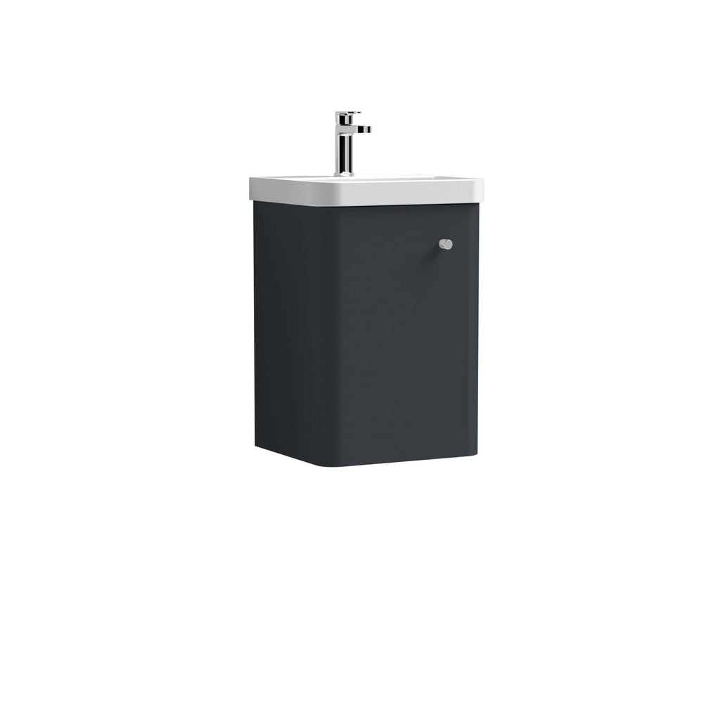 Sleek black bathroom vanity with integrated sink and modern chrome faucet, perfect for contemporary bathrooms, offering stylish storage and functional design.