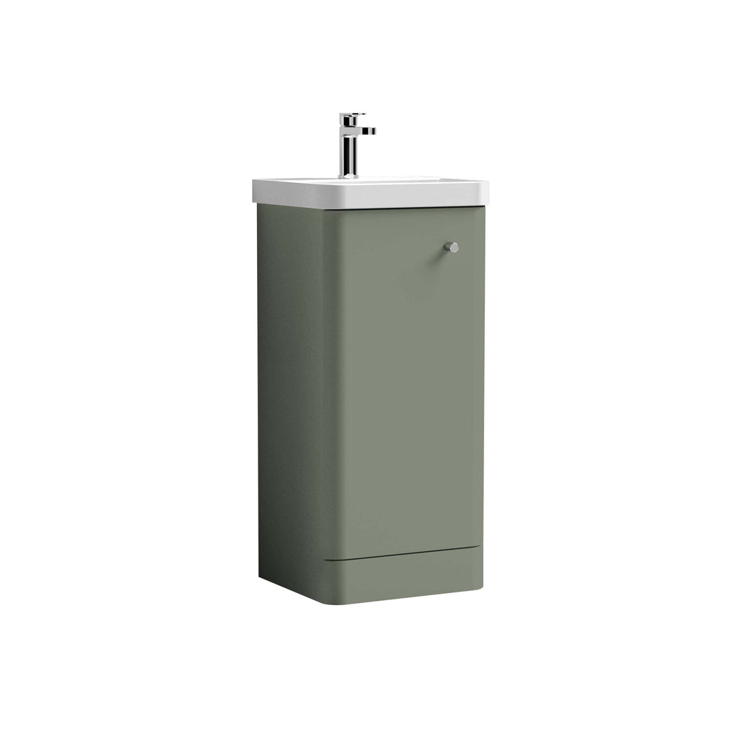 Compact bathroom sink with a built-in cabinet in sage green, featuring a modern chrome faucet and minimalist design, ideal for small bathrooms or powder rooms.