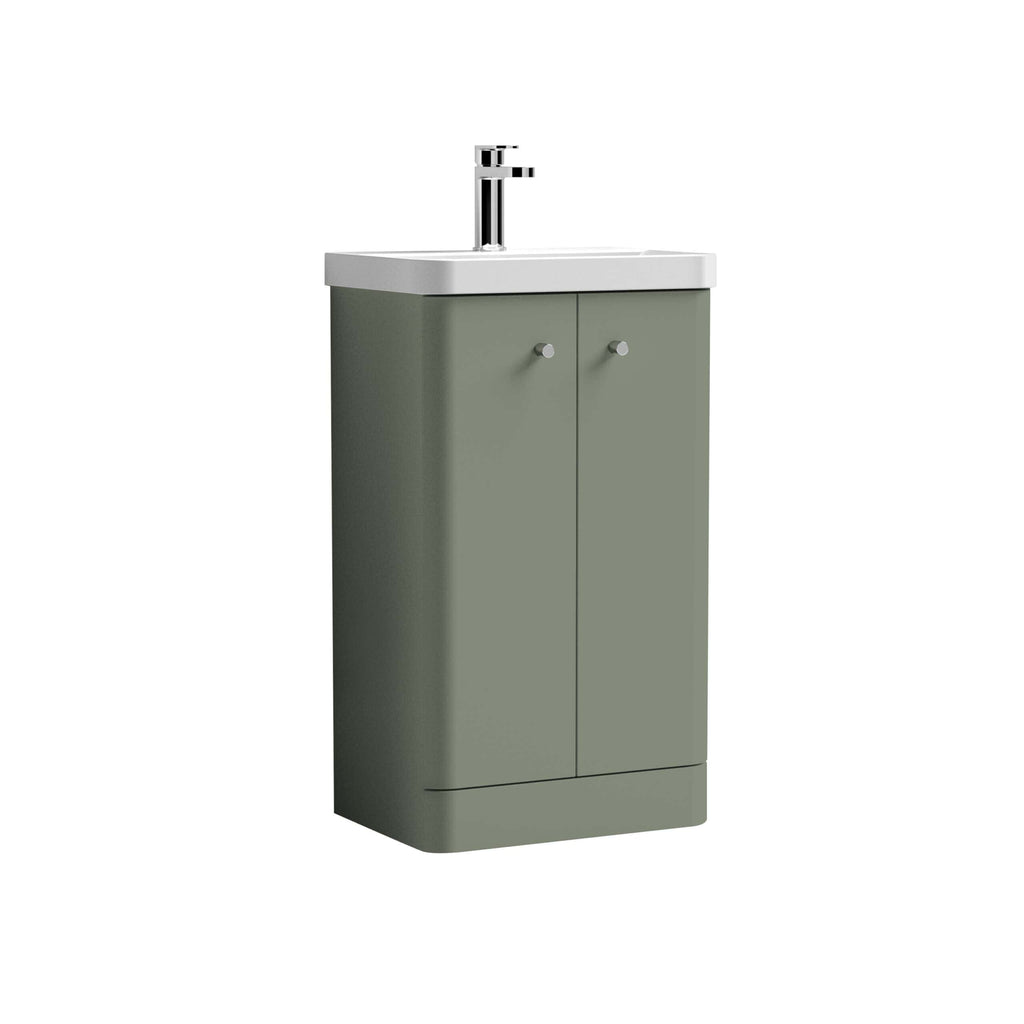 Modern green bathroom sink cabinet with white ceramic top and chrome faucet, ideal for contemporary bathroom bathrooms and storage solutions.