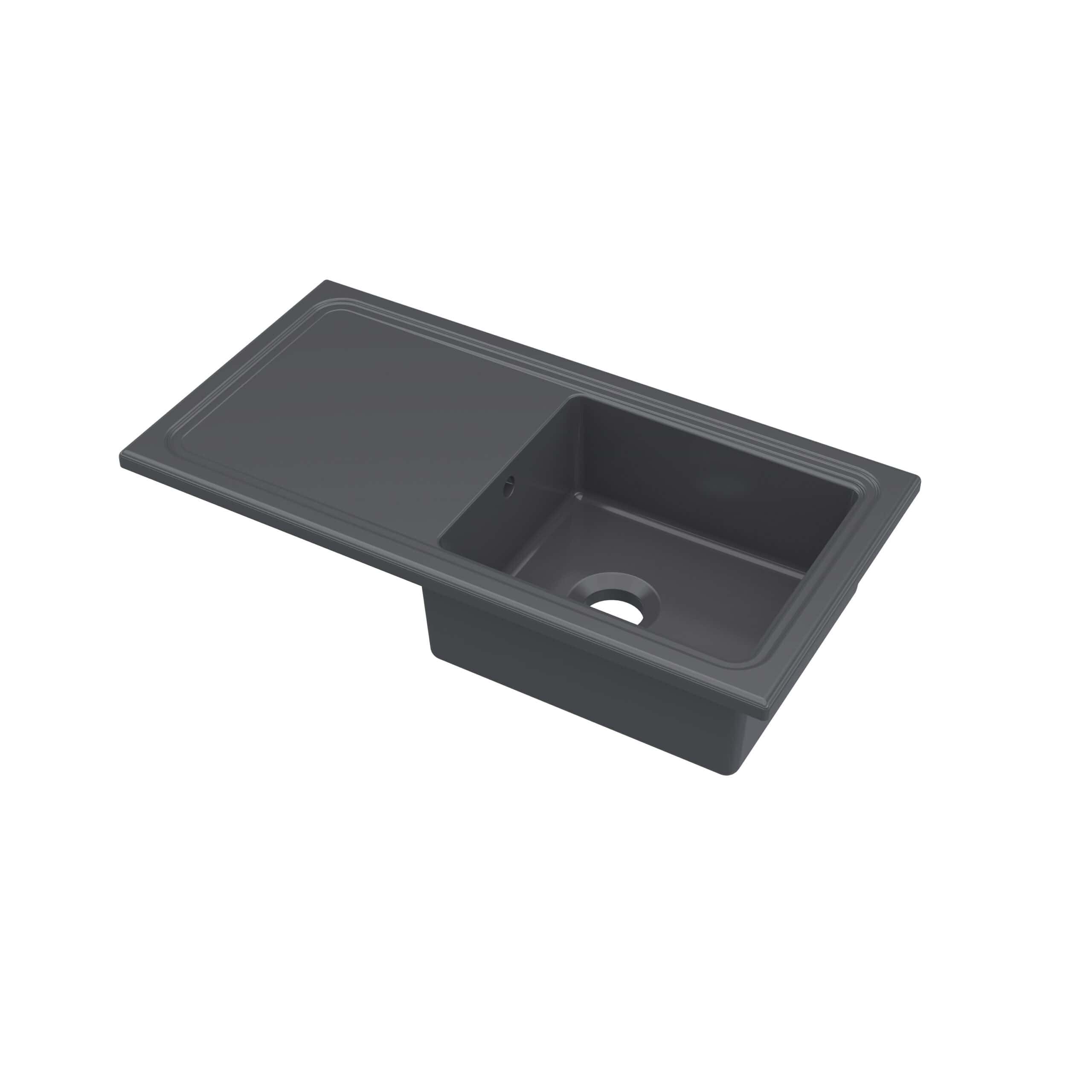 Black kitchen sink with integrated draining board, modern and durable design for contemporary bathrooms and kitchens. Perfect for efficient washing and food prep.