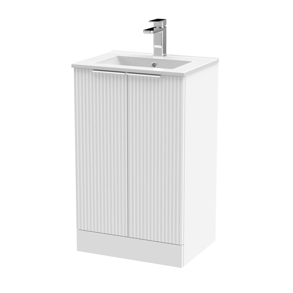 Sleek white bathroom vanity with integrated sink and modern chrome faucet, perfect for contemporary bathroom designs. Durable, stylish storage unit ideal for organising bathroom essentials.