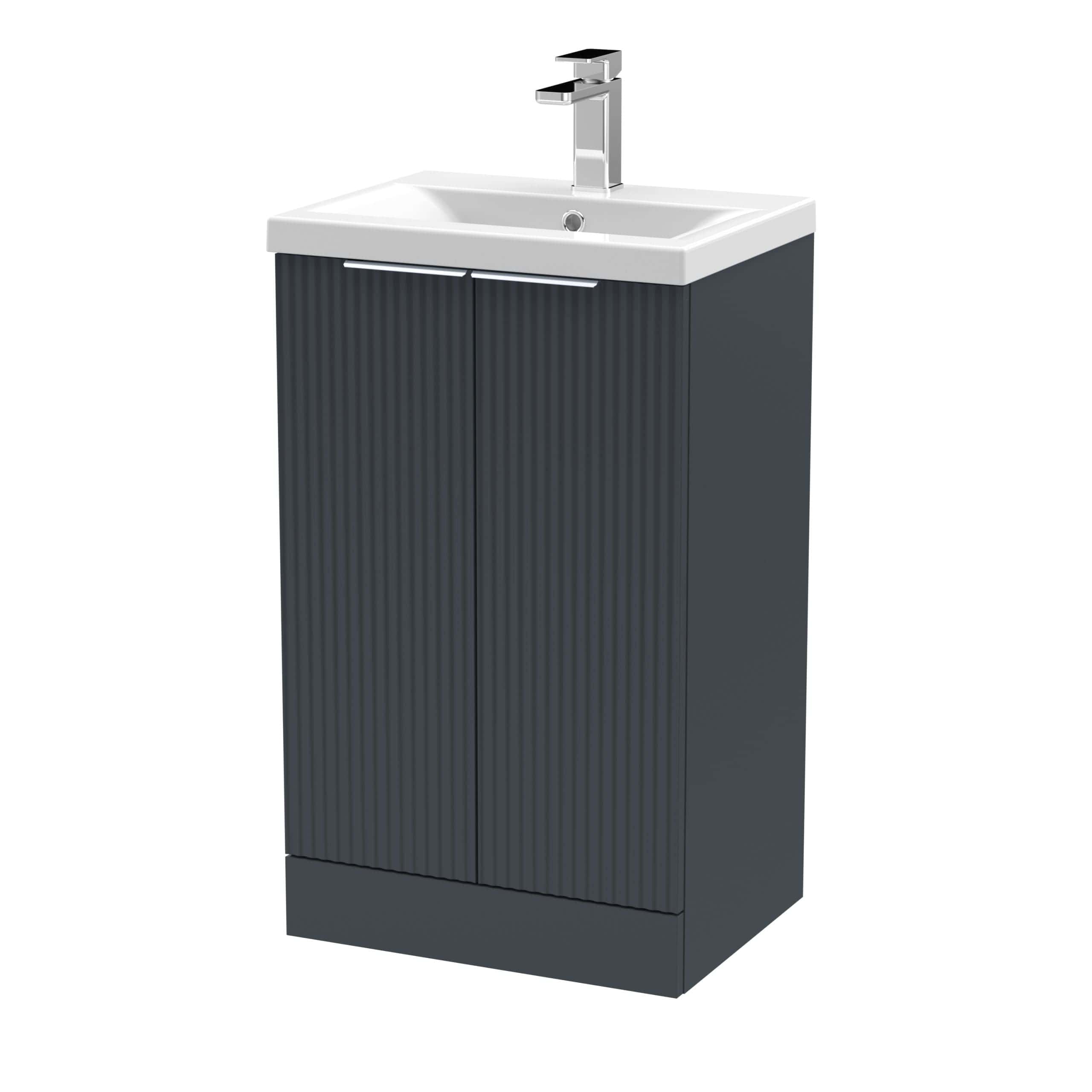 Sleek bathroom vanity unit with integrated sink and modern chrome tap, ideal for contemporary Bubly Bathrooms. Perfect for stylish, functional bathroom storage solutions.