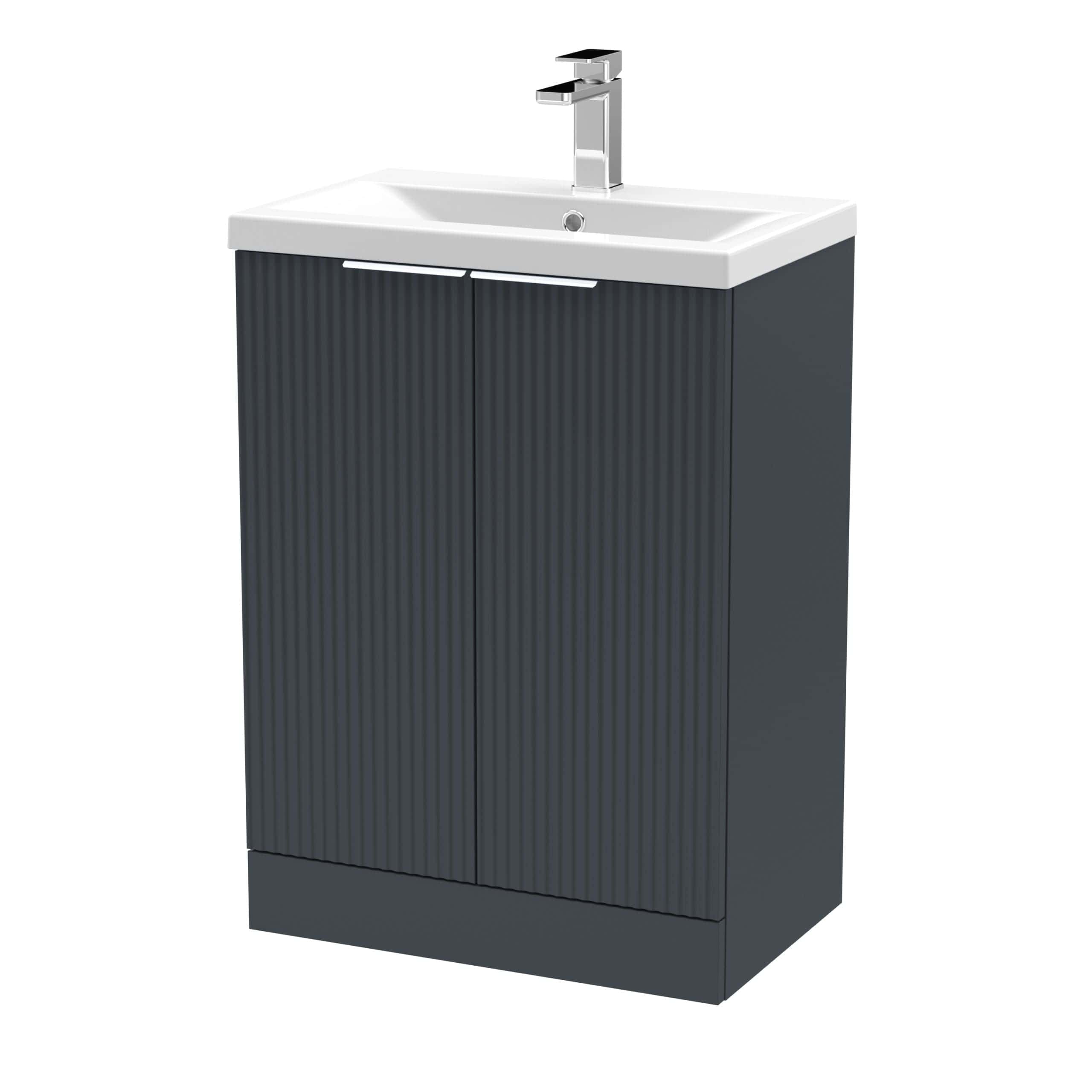 Modern bathroom vanity unit with a ceramic sink and stylish black ribbed cabinet, ideal for contemporary bathrooms.