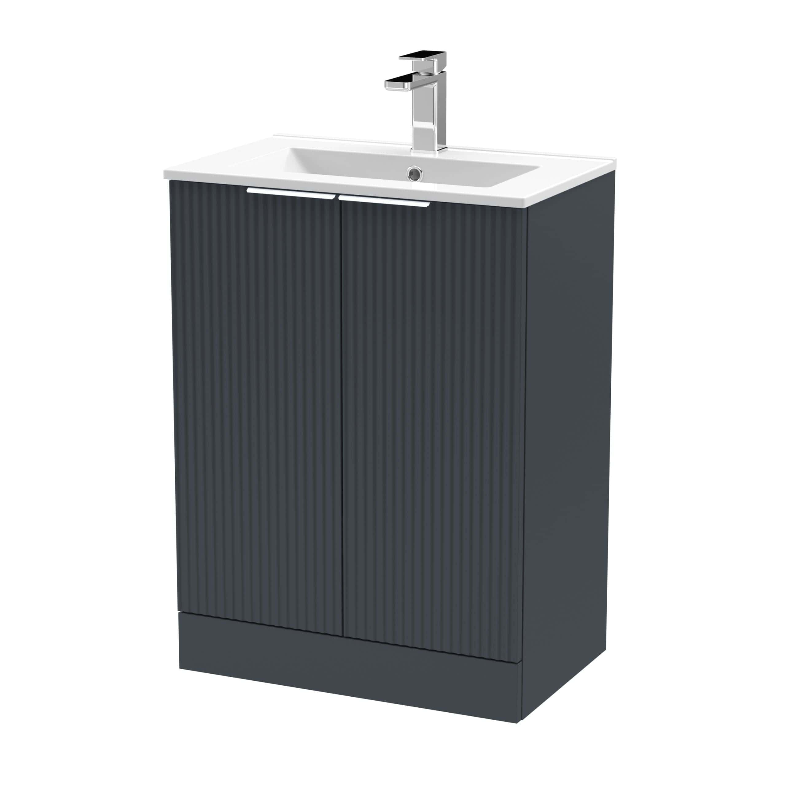 Modern bathroom vanity with a sleek black ribbed cabinet and a white countertop with integrated sink, ideal for contemporary bathroom designs.