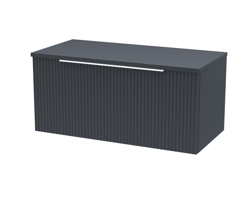 Contemporary navy bathroom cabinet with ribbed doors and sleek handle for modern bathroom storage solutions. Perfect for enhancing bathroom organisation and style.