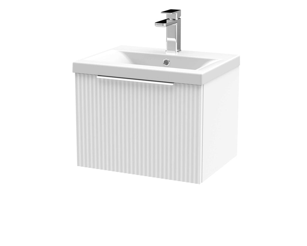 Modern white bathroom vanity with integrated sink and sleek chrome tap, perfect for contemporary damp room design.