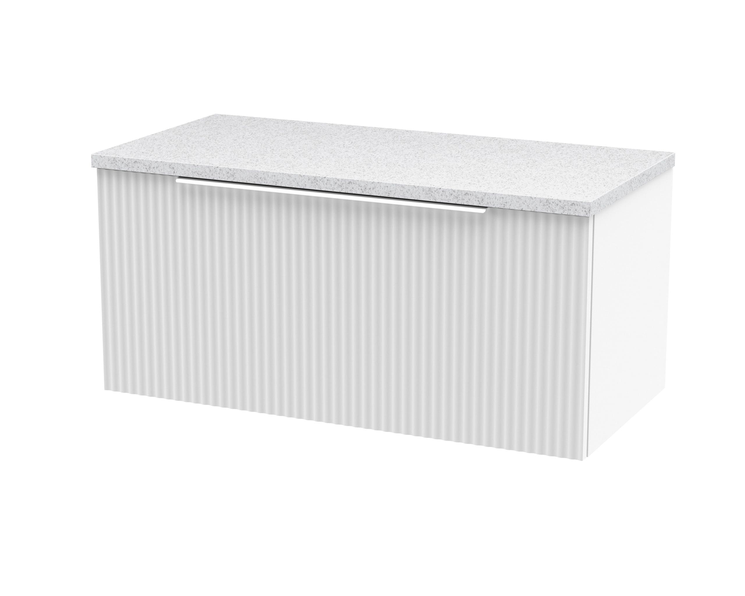 Contemporary white bathroom vanity with a textured front and a durable quartz countertop, ideal for modern bathroom designs and storage solutions.